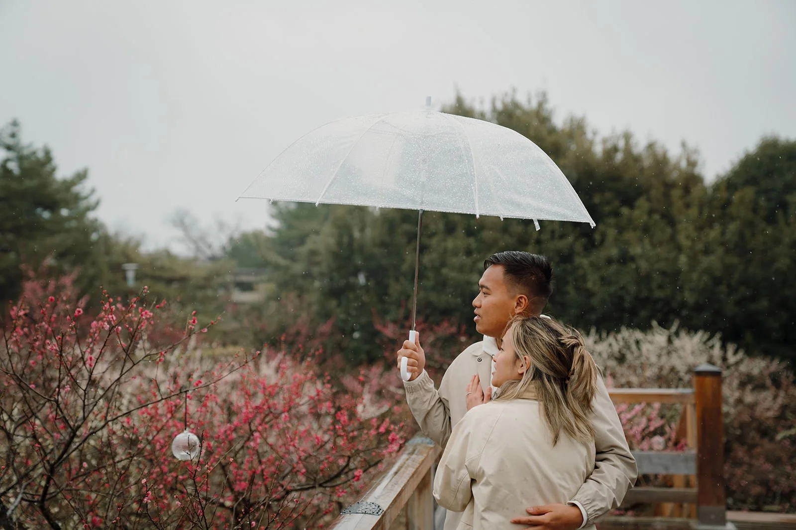 Engaged couple rain Kitano Tenmangu Kyoto winter