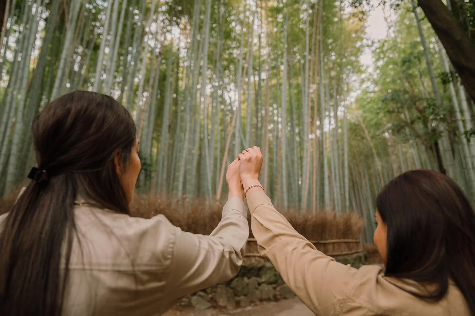 Couple portrait bamboo grove Arashiyama Kyoto spring morning