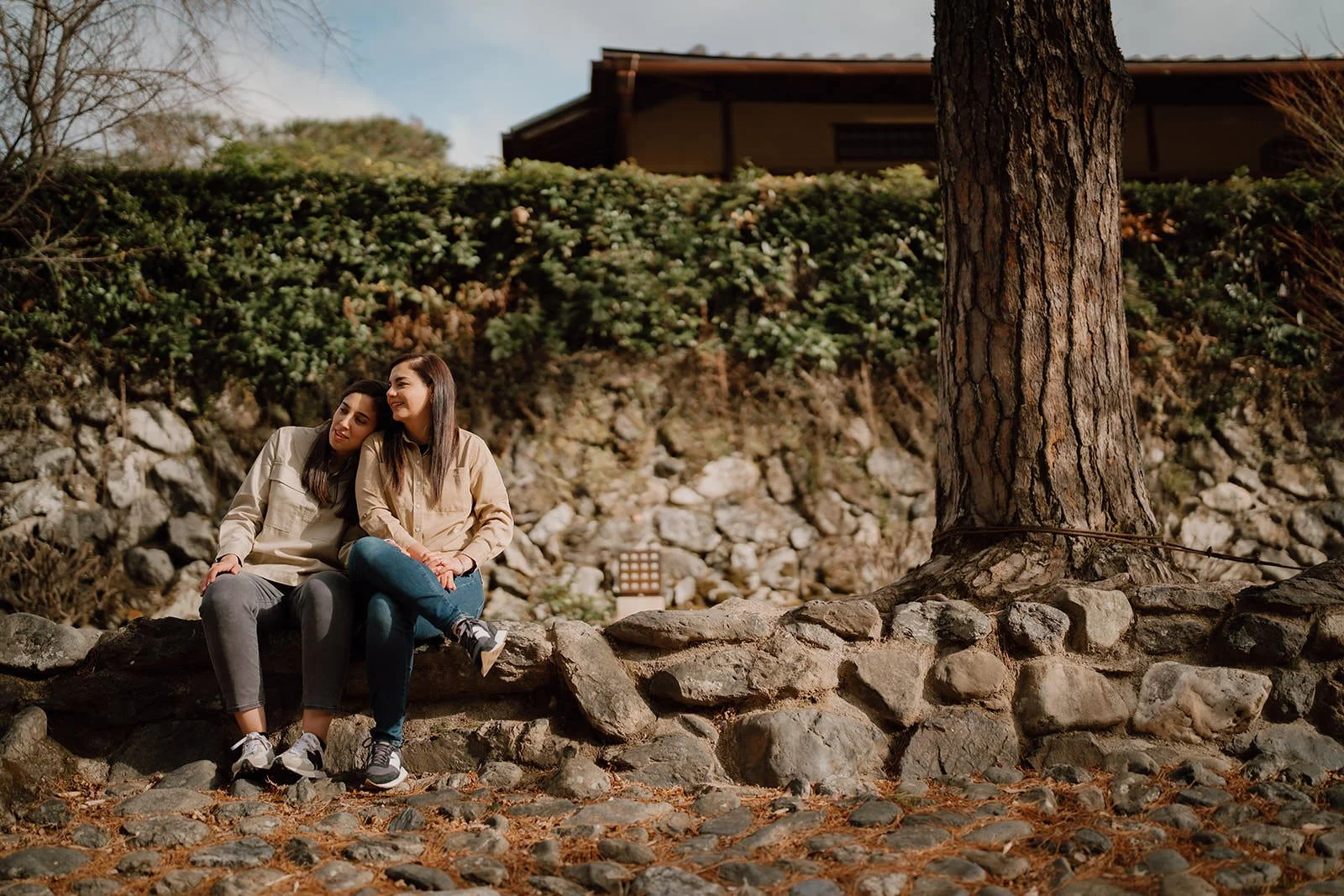 Engaged couple bamboo grove Kyoto spring morning light