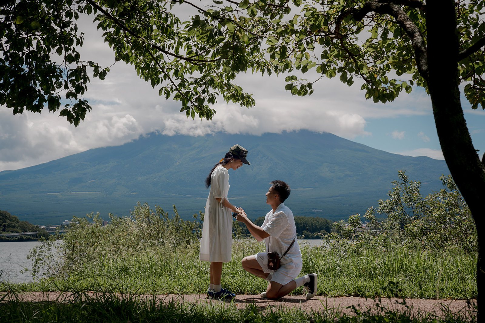 Couple embracing during proposal at Kawaguchiko