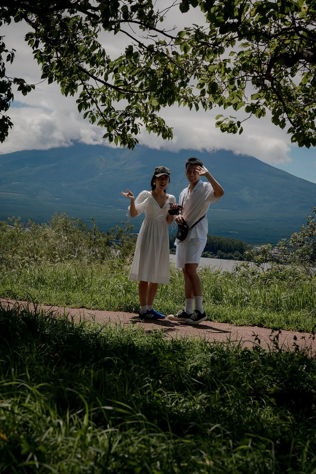 Newly engaged couple in the shade at Kogamasao Memorial Park