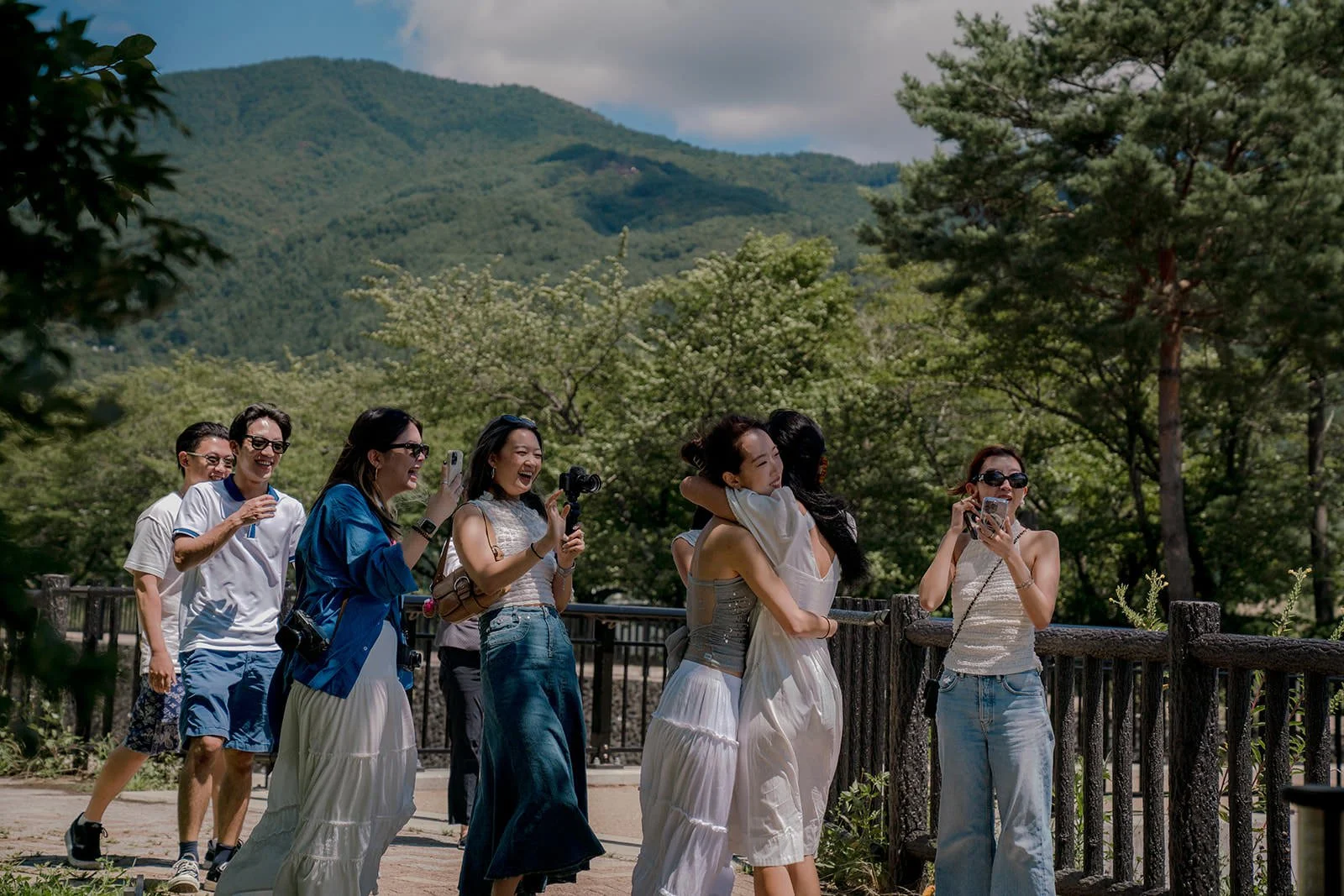 Friends surprising the newly engaged couple Kogamasao Memorial Park
