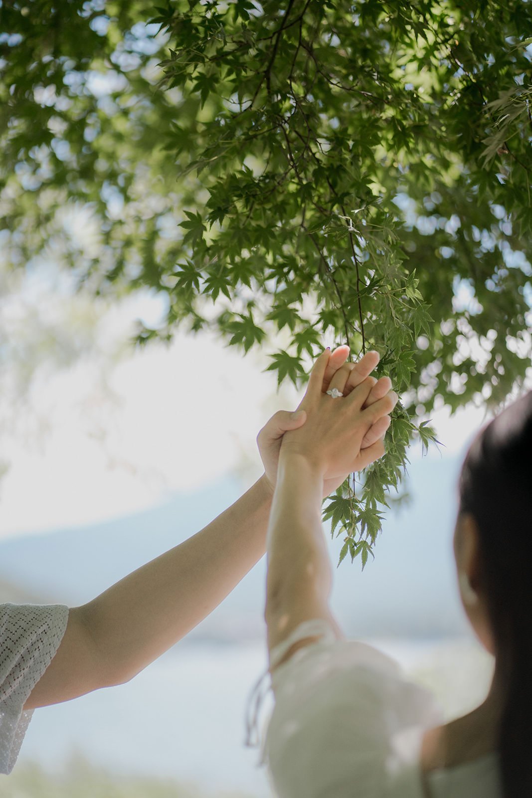 Couple walking at Kogamasao Memorial Park after proposal