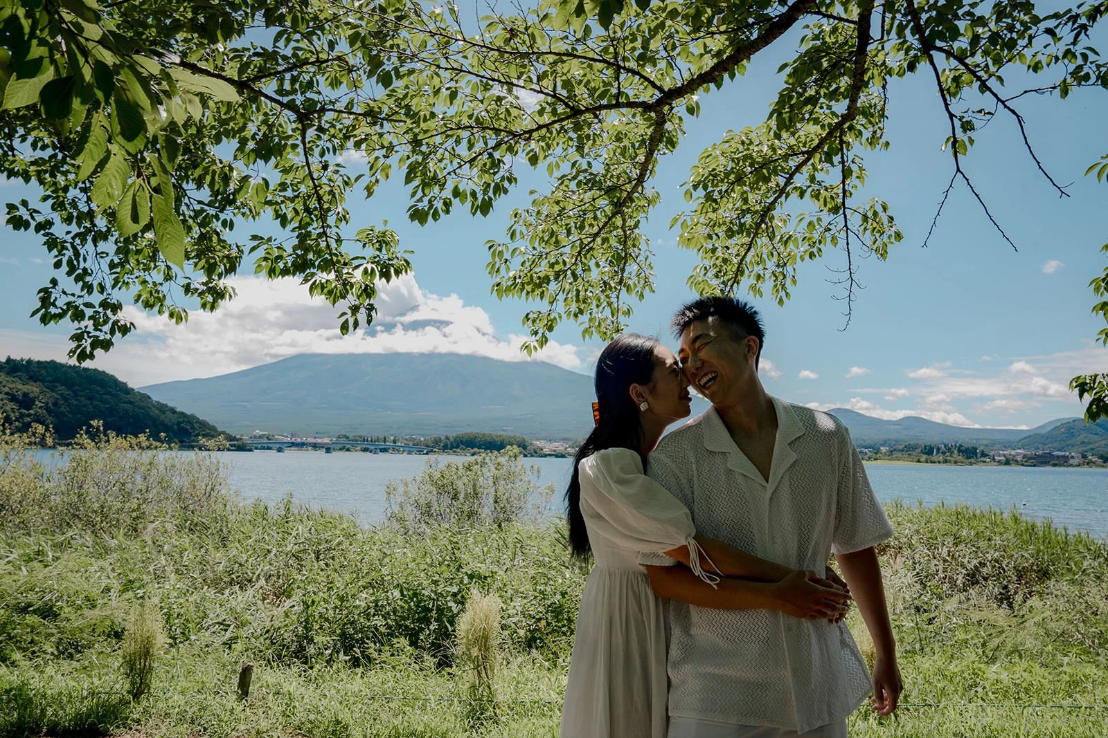 Engaged couple close up portrait Kawaguchiko summer morning