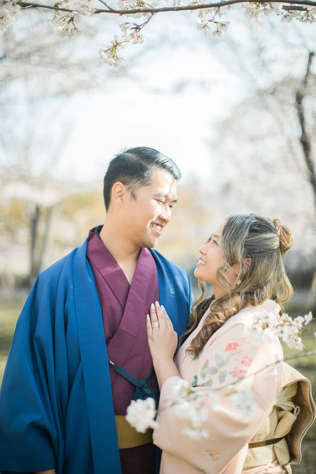 Kimono proposal photoshoot at Osaka Expo Park with cherry blossoms 12 of 27