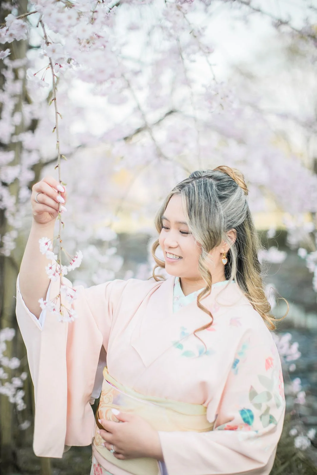 Kimono proposal photoshoot at Osaka Expo Park with cherry blossoms 18 of 27