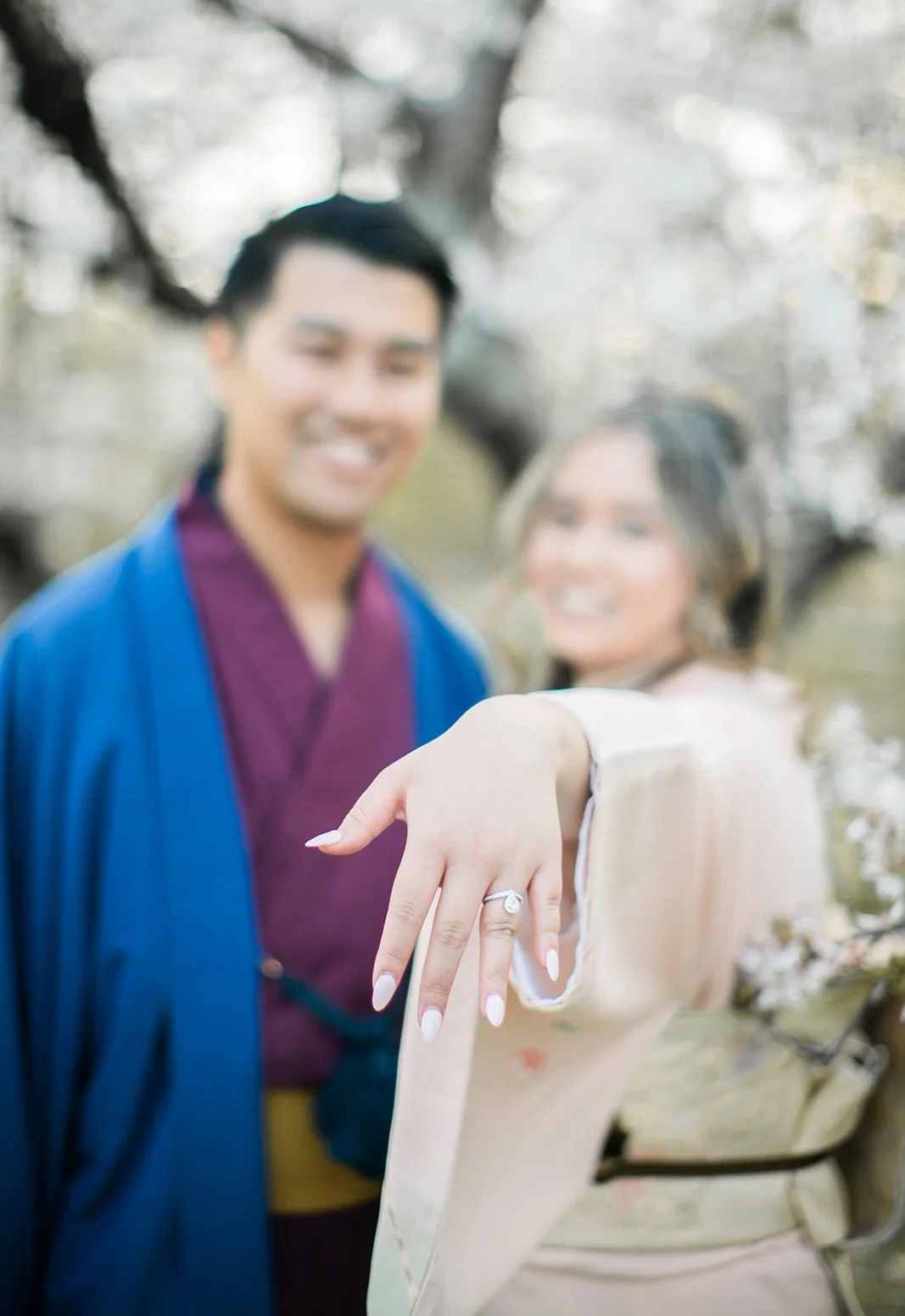 Kimono proposal photoshoot at Osaka Expo Park with cherry blossoms 23 of 27