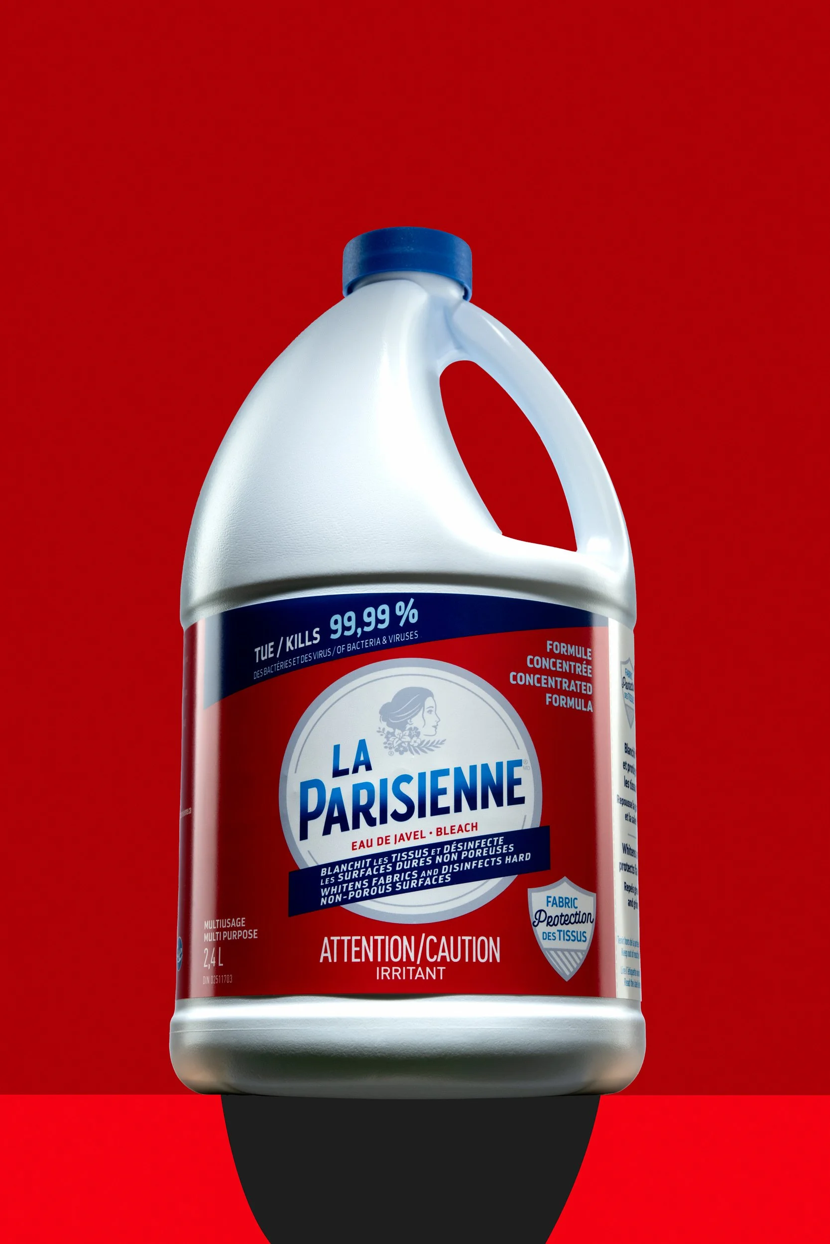 White bottle of La Parisienne bleach with blue cap on a deep red backdrop