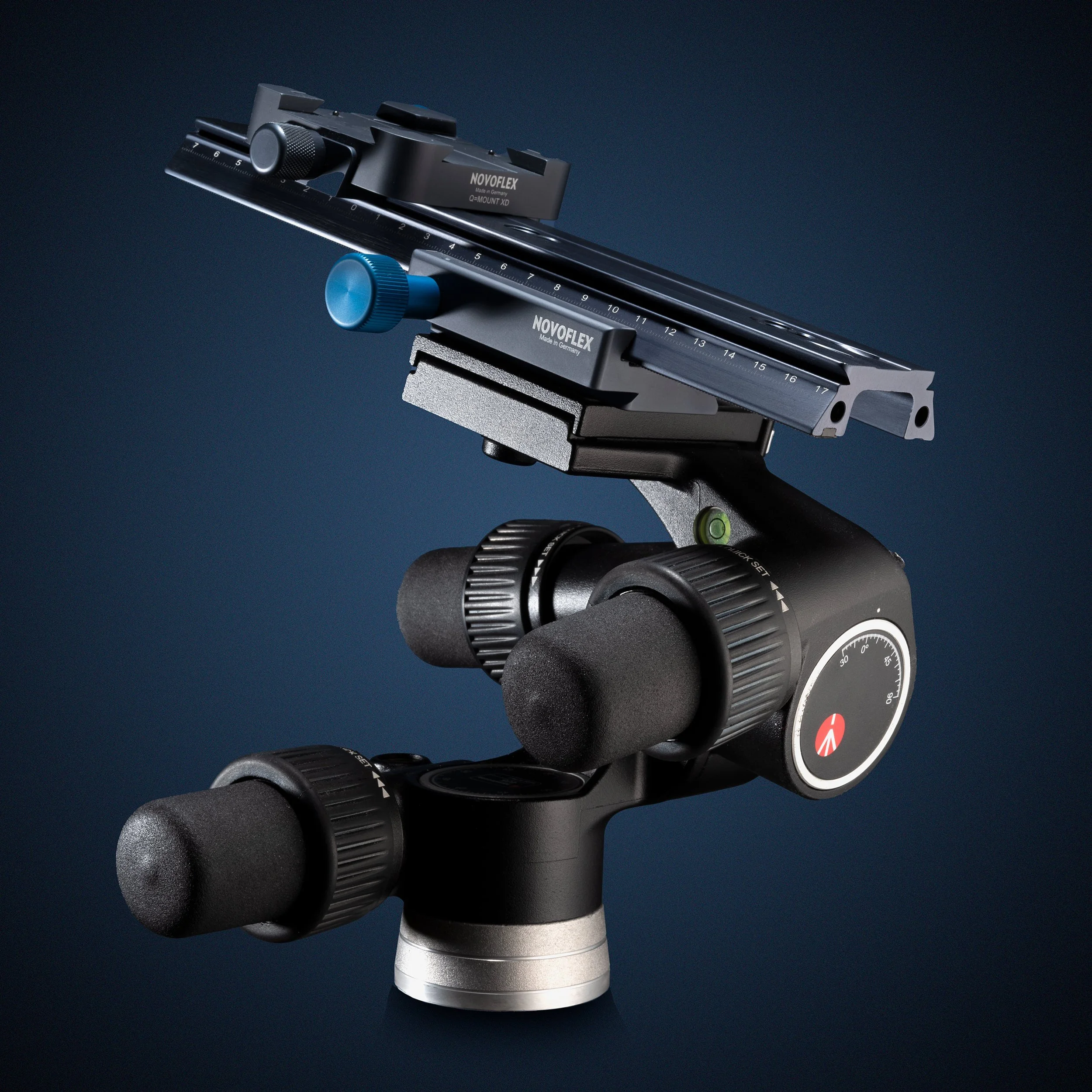 Precision geared tripod head with Novoflex macro rail photographed on dark blue gradient