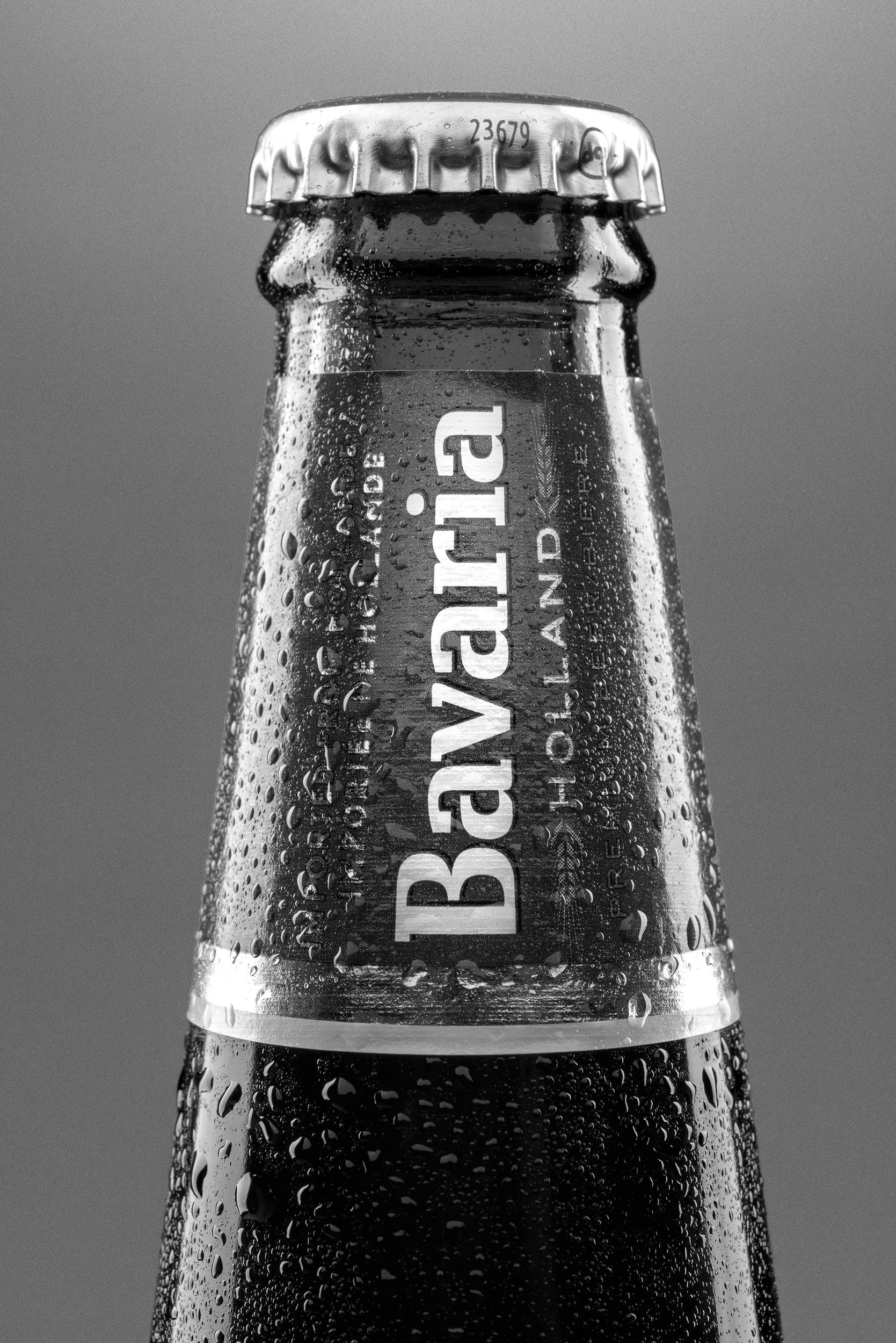 Close-up of Bavaria beer bottle neck with condensation