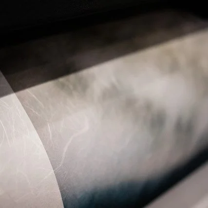 Close-up of translucent washi paper with visible fibers