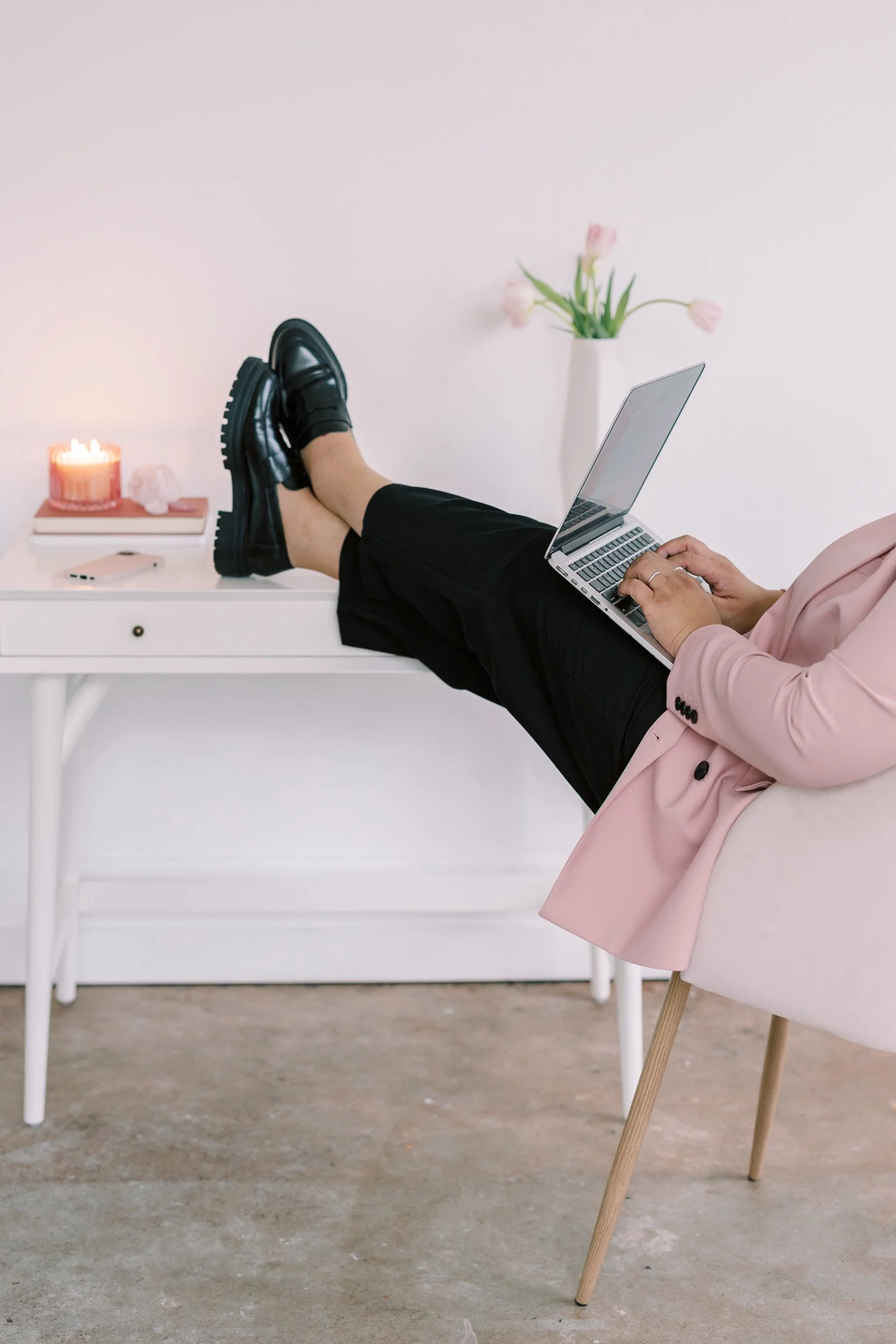 Woman-with-feet-on-desk-working-laptop