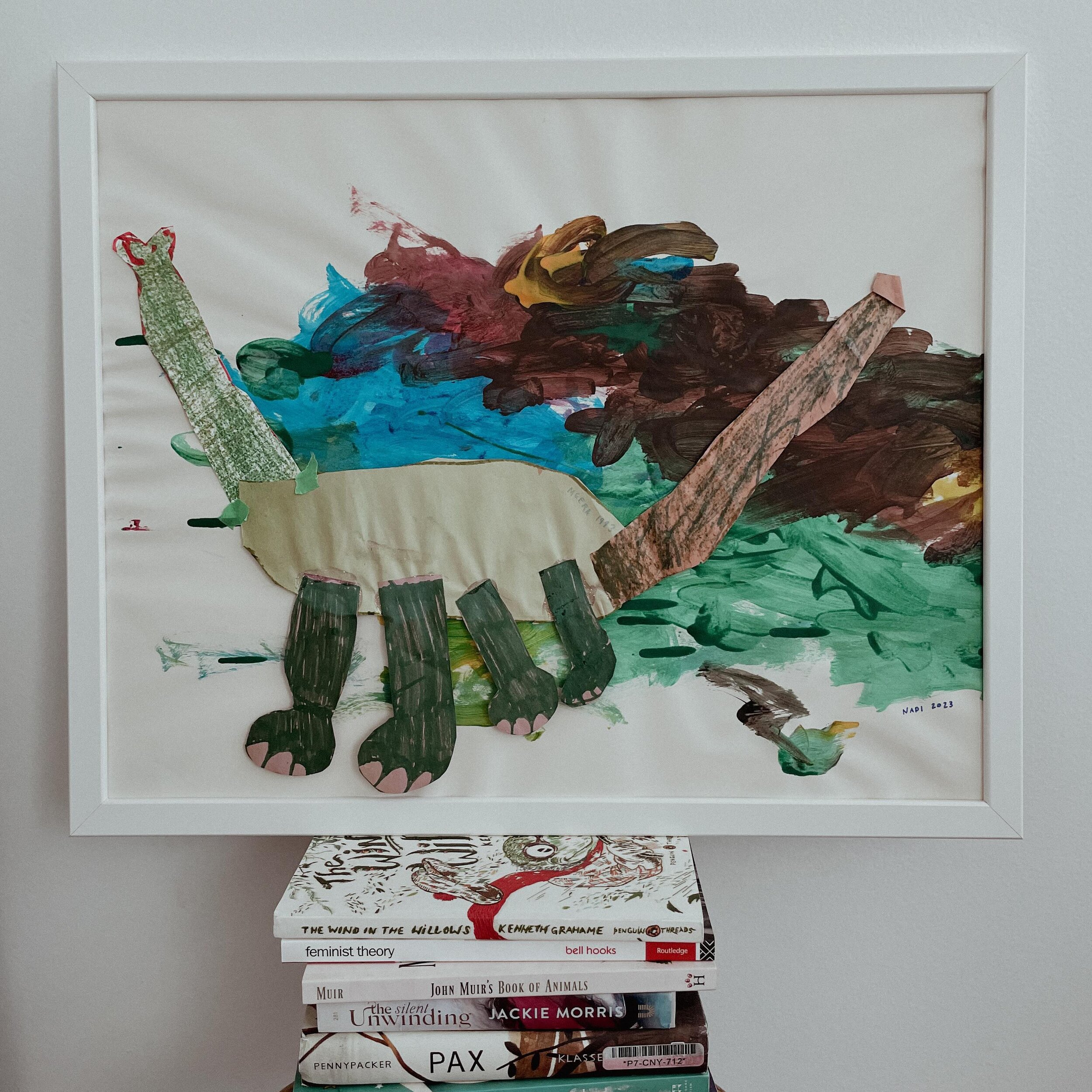 UNTITLED #1: a collaboration between me (age 6) and N (age 3)&mdash;the first, I hope, of many. i made the paper dinosaur as a child and N made the landscape painting behind it a few months ago.

i wrote more about this painting and what i learned fr