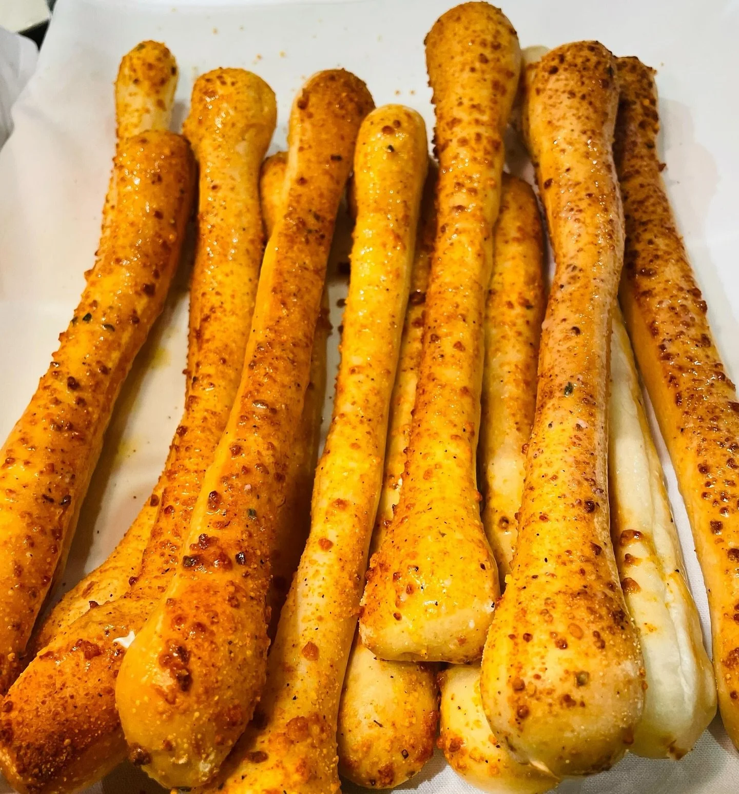 Our homemade breadsticks are irresistibly delicious! Fresh from the oven, buttery, herby, and impossible to stop at just one. Luckily&hellip; you don&rsquo;t have to! 
.
.
.
.
.
#breadsticks #bread #garlicbreadsticks #homemadebreadsticks #homemade #i