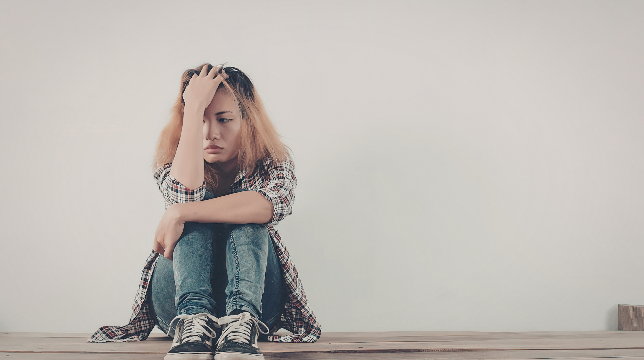 asian woman struggling with internalized ableism