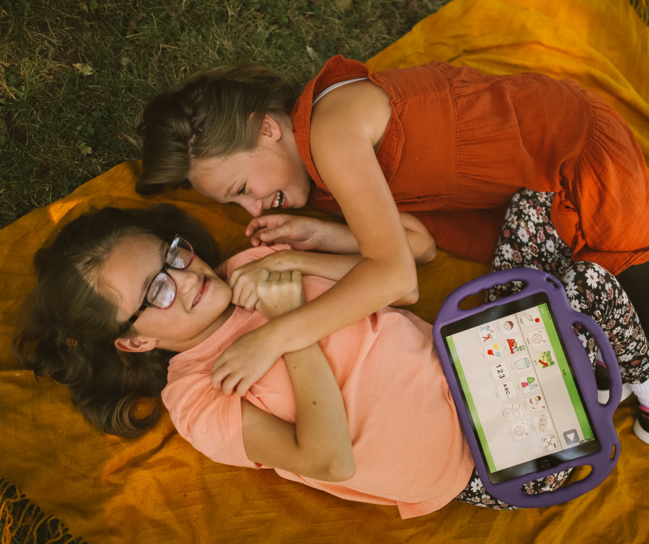 Two children laughing.
