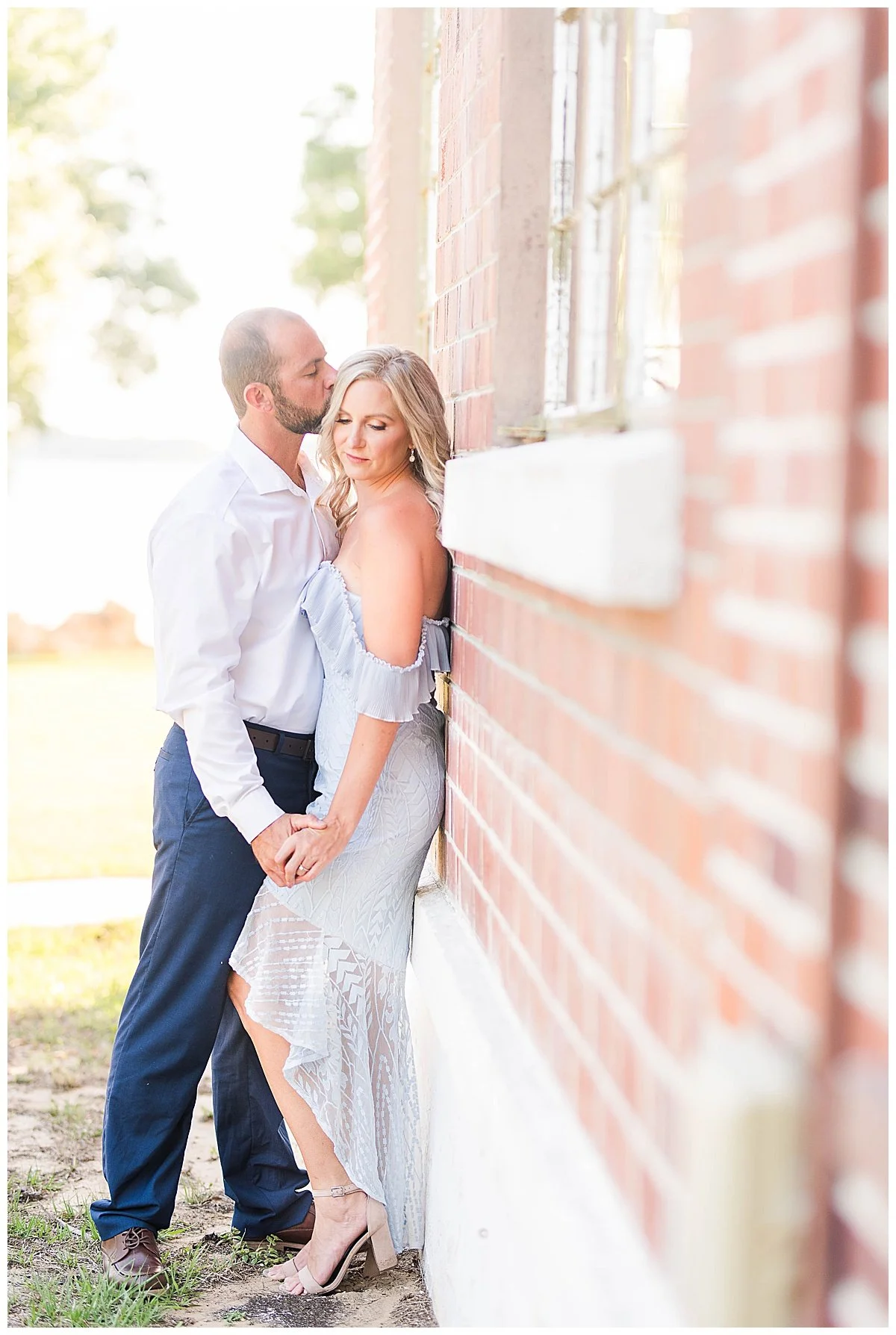 Romantic engagement session. Bride wearing a dress by a boutique called  Hello Molly.