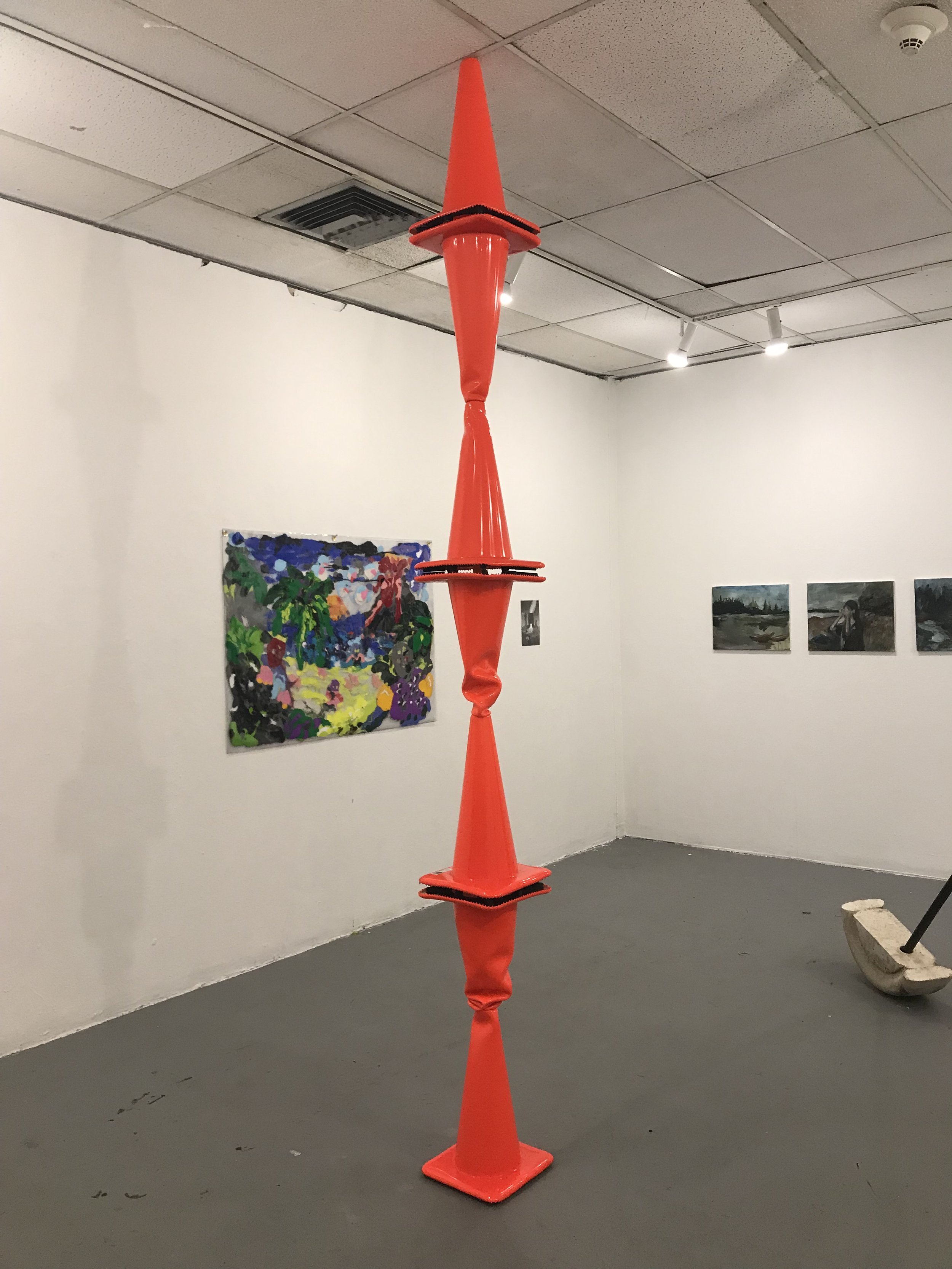 Cone Tower, 2019. (Purchase College MFA Show "New Car Smell")
Traffic cones, painters pole.
10 x 10 x 96 in