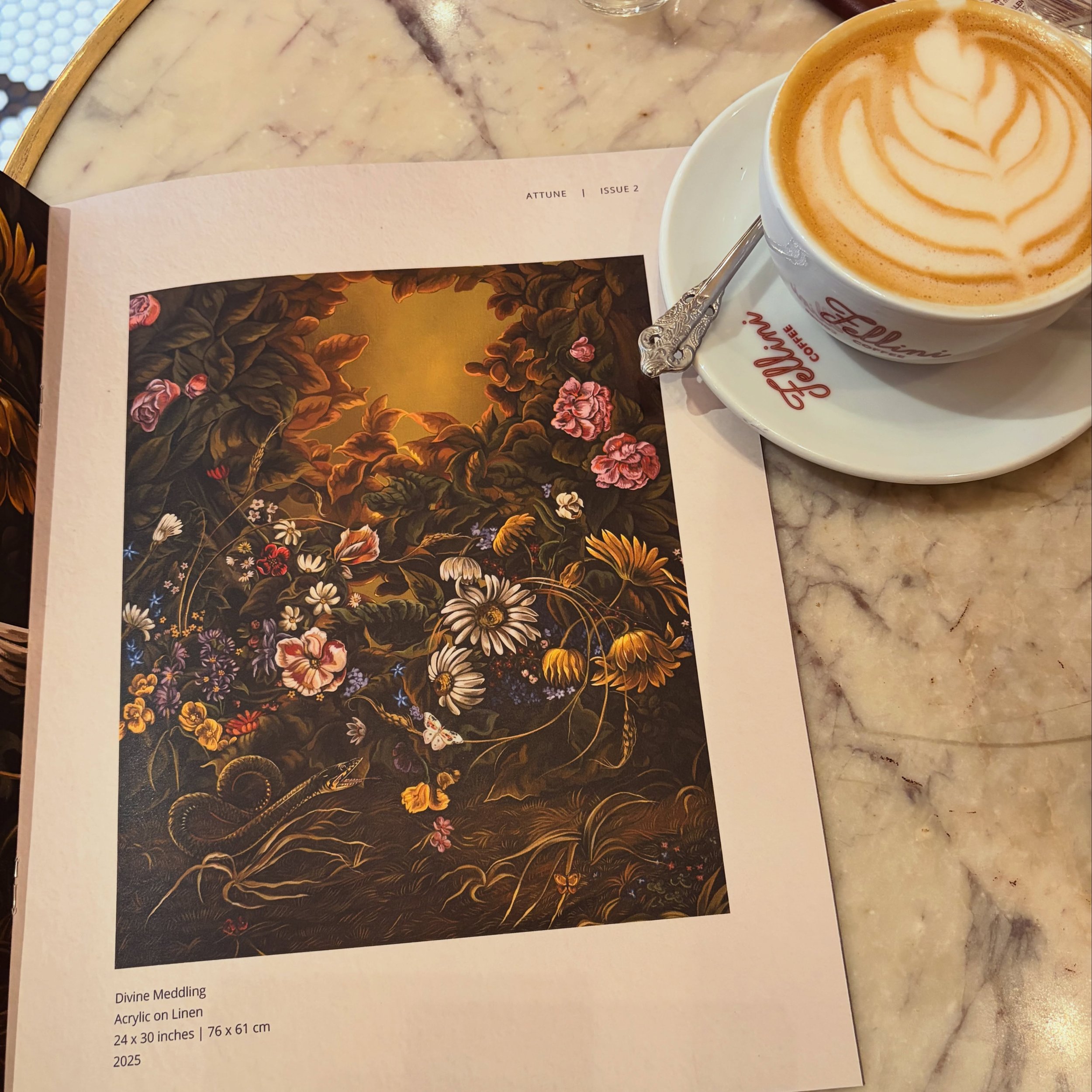 Attune out in the wild @fellinicoffee ☕️ featuring gorgeous artwork from @sabrinabockler.