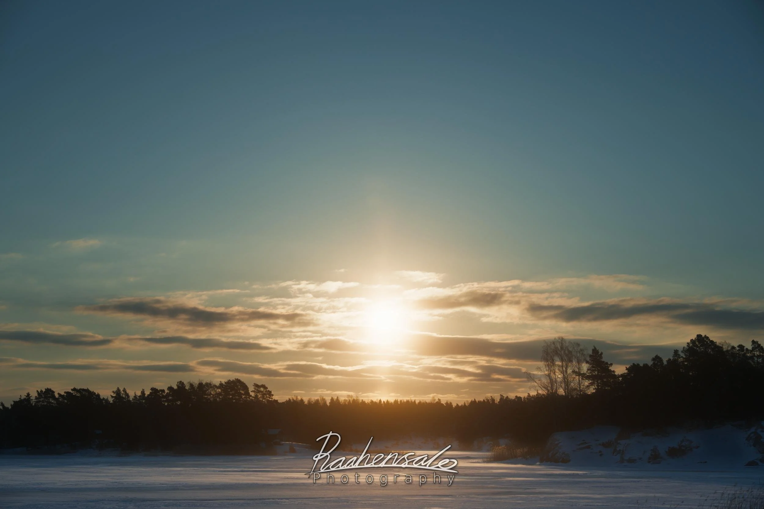 Sunpillar in winter landscape