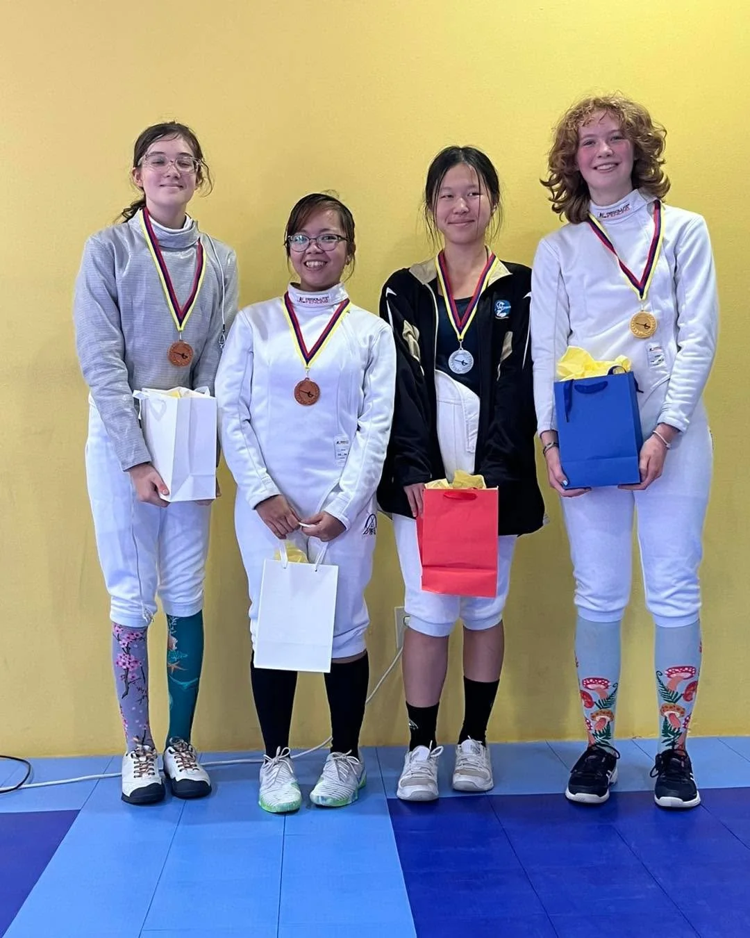 Two weeks ago, we hosted our first tournament of the season! Many of our fencers medaled in our various events, and for others they took the scary first step into competition for the first time!

Our prizes were apple cinnamon themed and for the firs