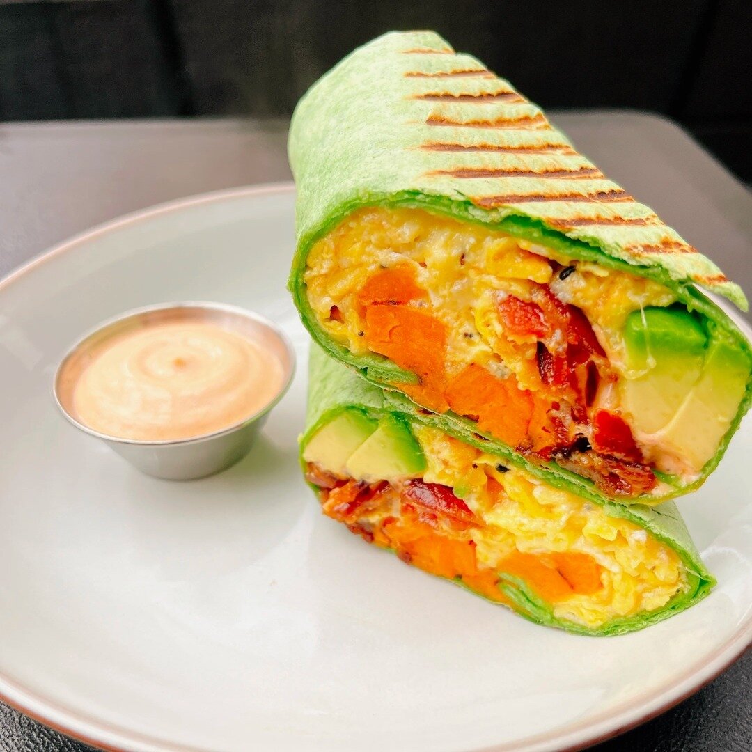 Have you tried our Cali Wrap? 🌯 ⁠
⁠
🍳 Everything seasoned organic scrambled eggs⁠
🥓 Crispy smoked bacon⁠
🥑 Creamy avocado⁠
🌶 Chipotle aioli⁠
🍠 Sweet potato hash⁠
🧀 Melted American cheese⁠
🥬 All wrapped up in a spinach tortilla⁠
⁠
#BlackLabCaf
