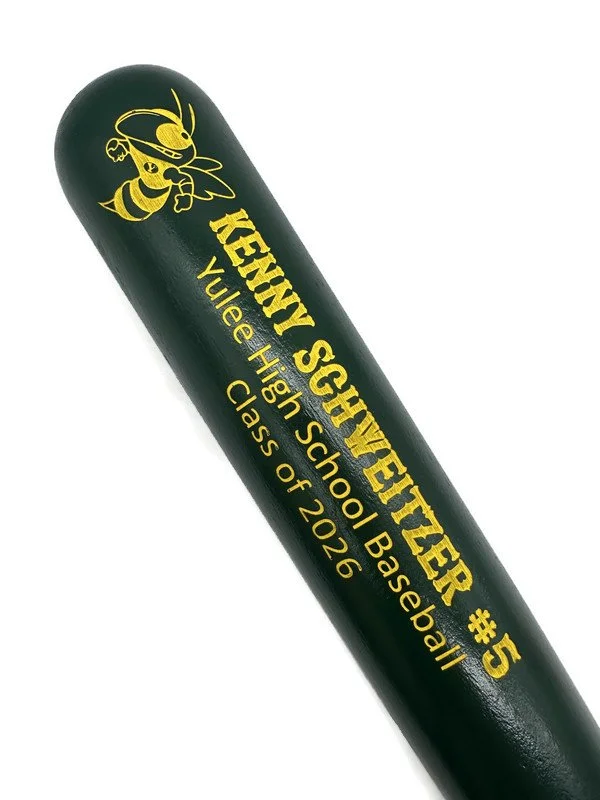 Green painted bat with engraved yellow lettering.jpg