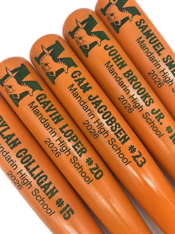 orange and green engraved baseball bat.jpg
