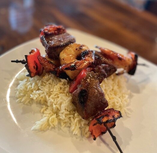 Available Thurs - Sun after 4pm! 

Beef and Shrimp Kabobs 
Grilled Beef tenderloin tips, tail on shrimp, pepper and onions dressed with teriyaki and served on citrus rice