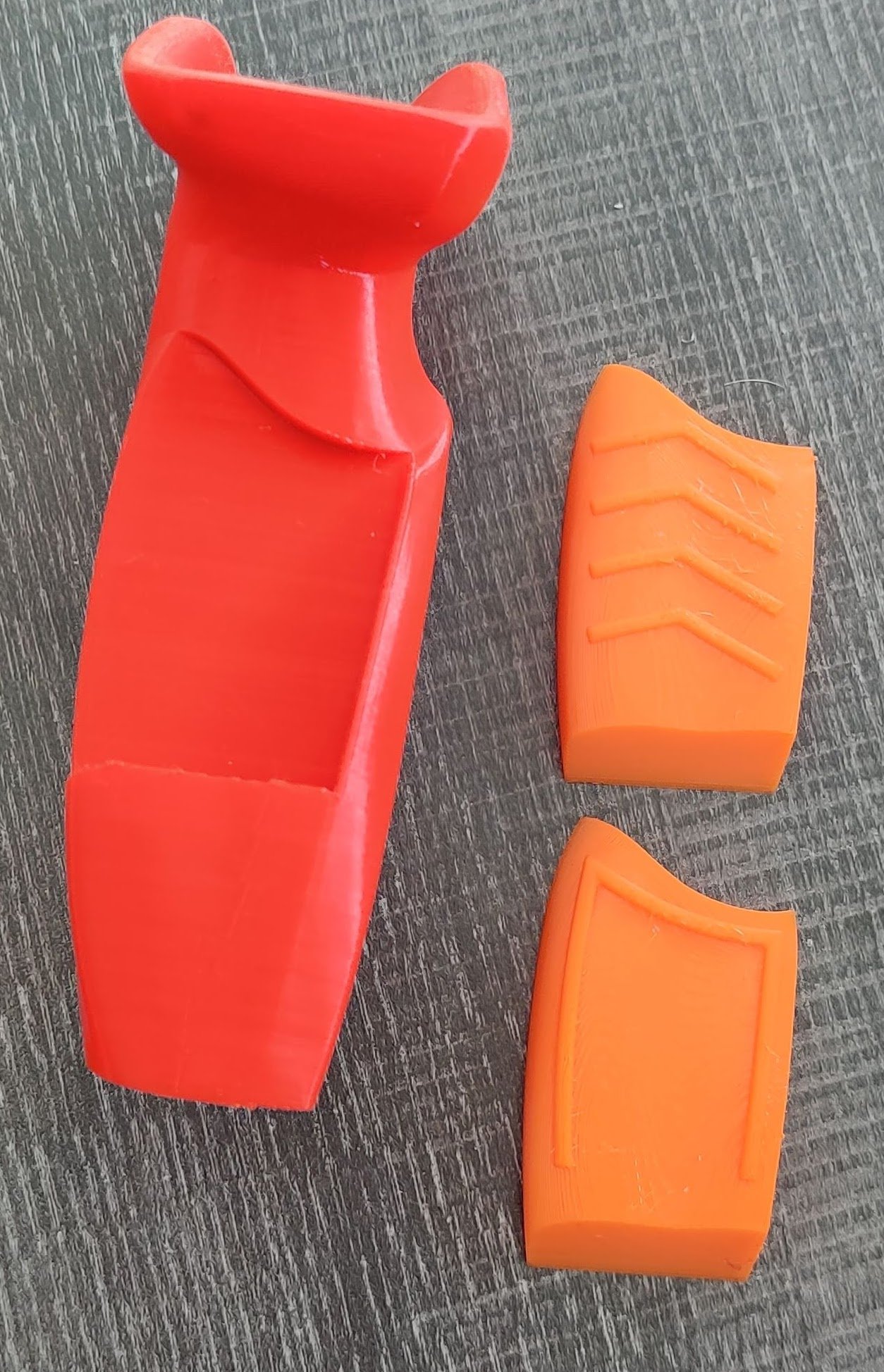Modular Palm Grip design to allow for different traction patterns at the pressure point.  Customized to the feel the archer is looking for.