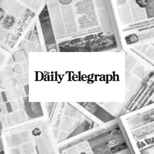 A collection of newspapers with a prominent logo for The Daily Telegraph in the center.