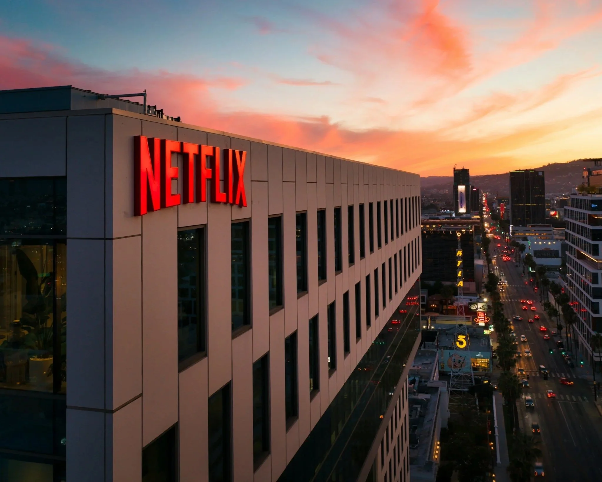 Netflix headquarters building with the red Netflix logo, symbolizing the global streaming giant influencing Hollywood, film distribution, and digital entertainment trends.