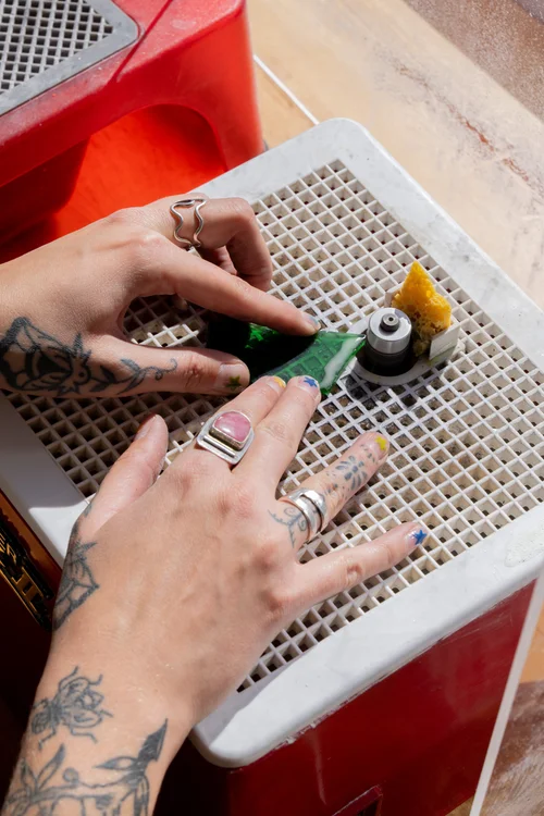 Grinding a piece of stained glass
