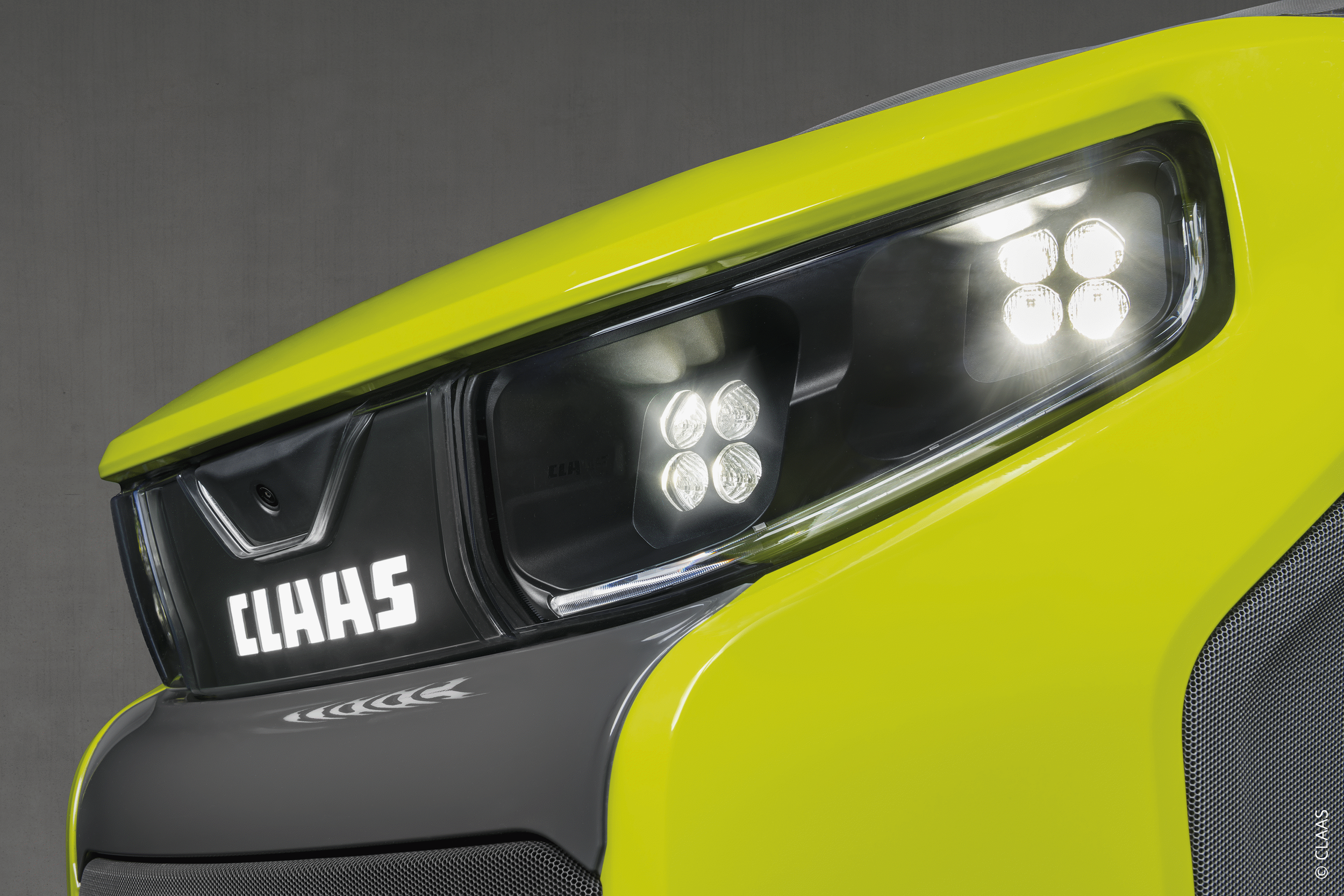 FORVIA HELLA develops illuminated CLAAS emblem for Axion 9 tractor