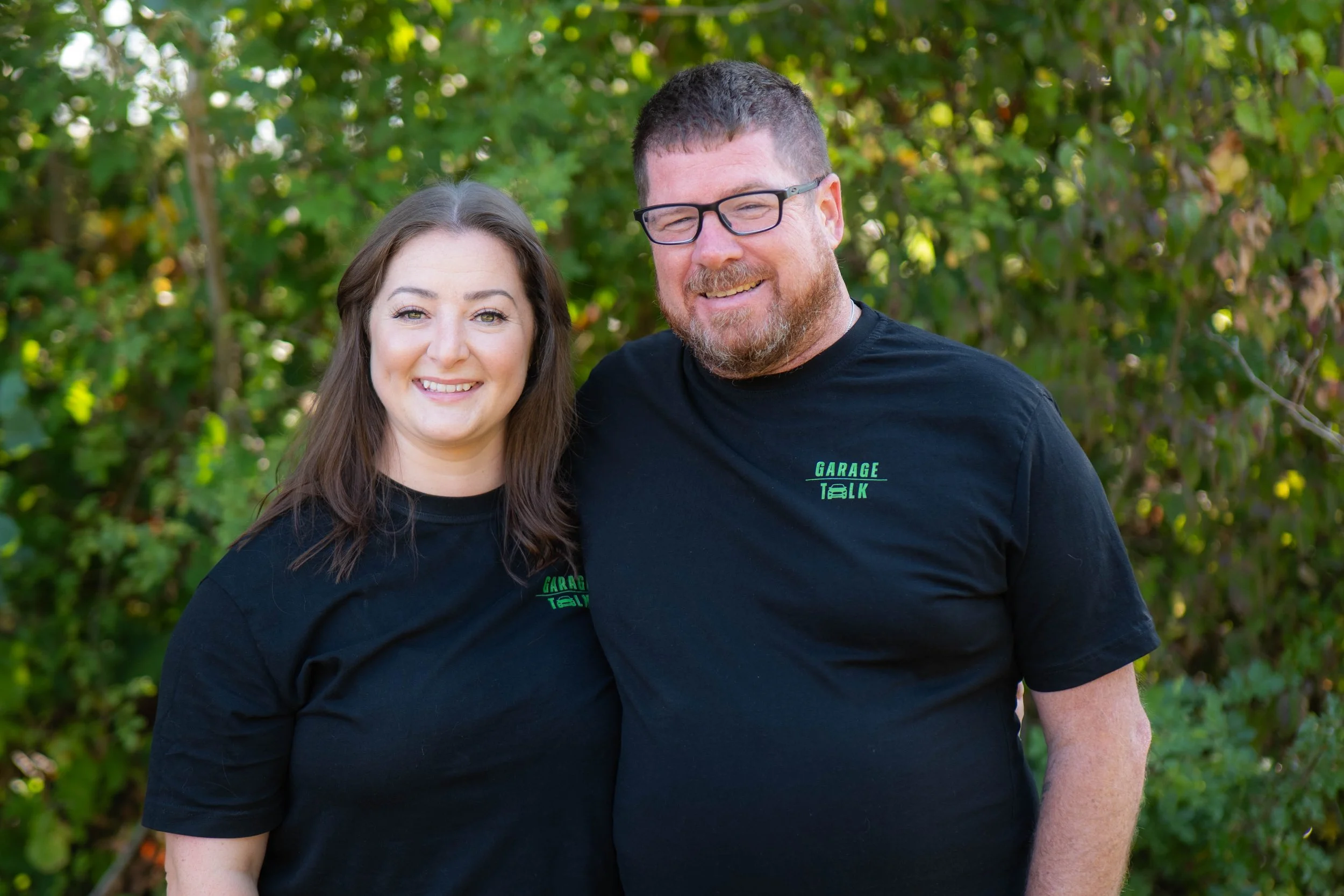 Image of Ben & Vicky in front of trees