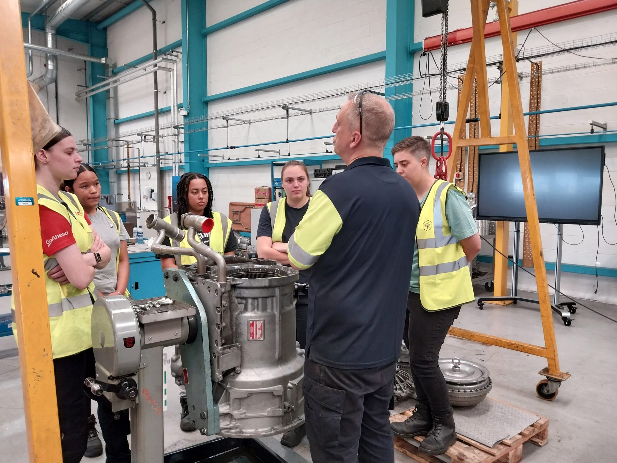 Six female apprentices take part, reflecting growing diversity within bus and coach engineering