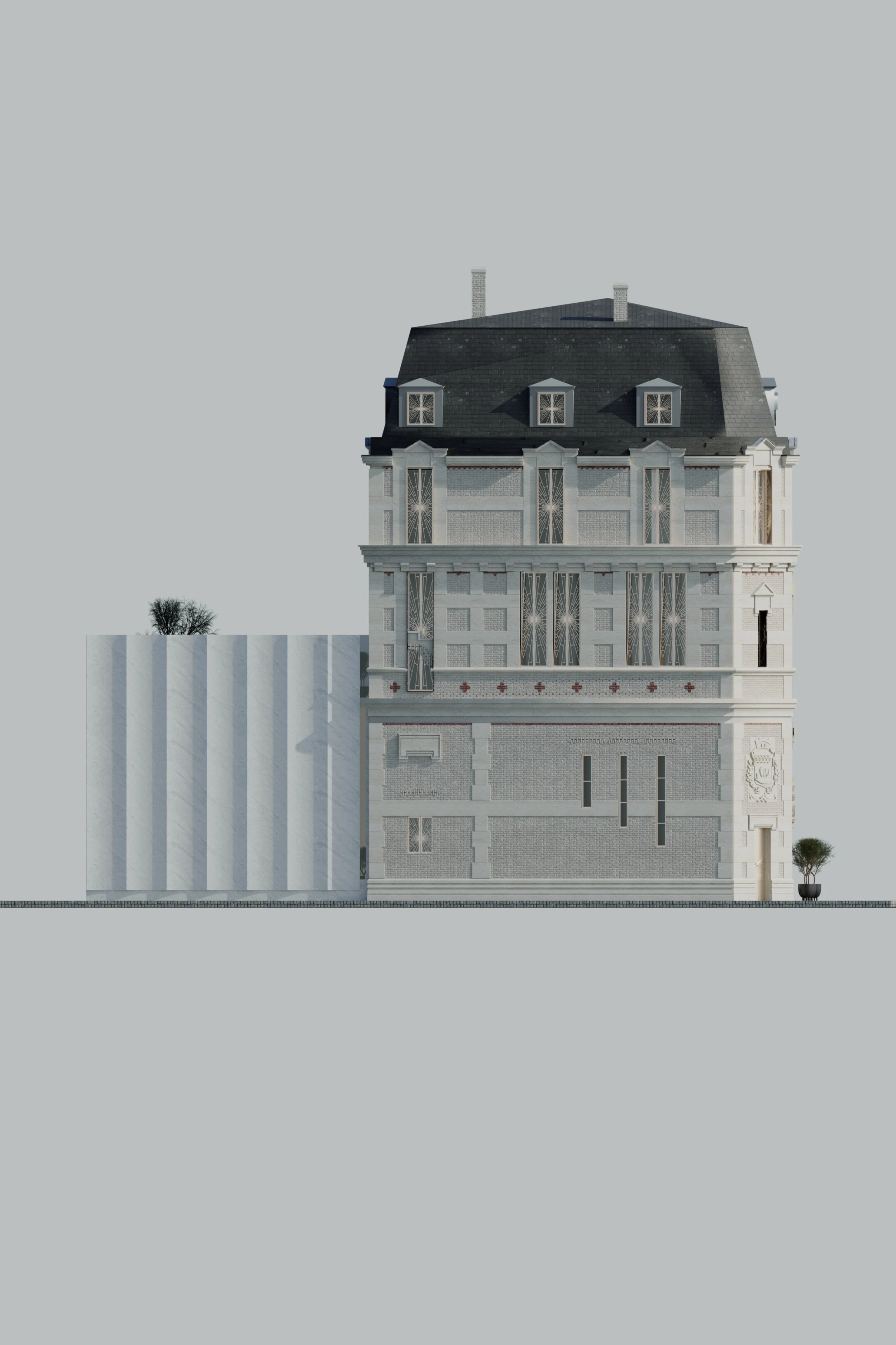 A historic white stone building with a black mansard roof, several narrow windows and intricate architectural decorations.