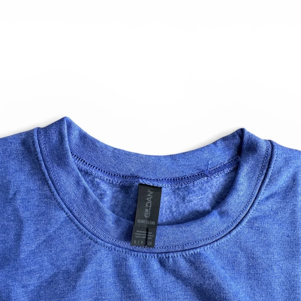 Sweatshirt tag saying "Gildan heavy blend"