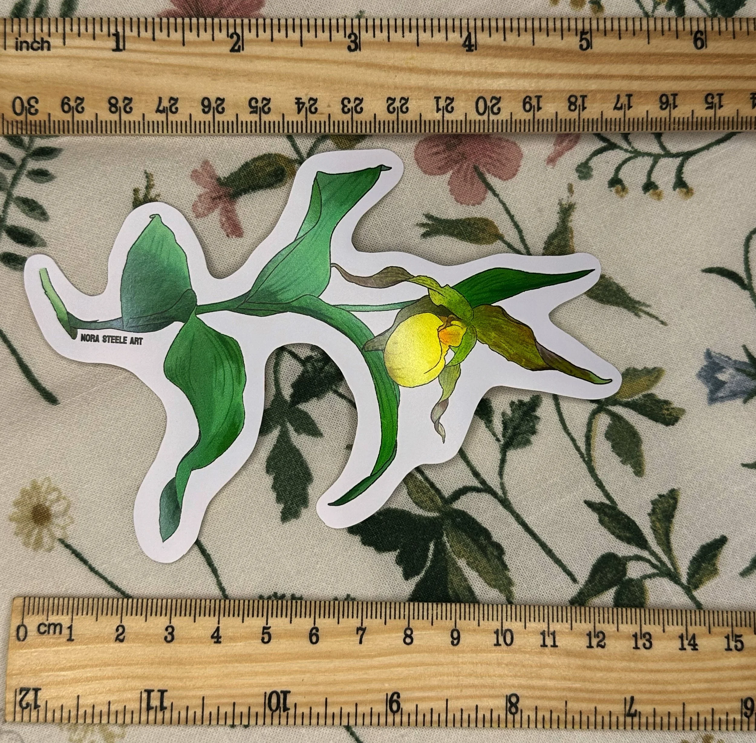 Yellow ladys slipper sticker measuring about 5 inches long