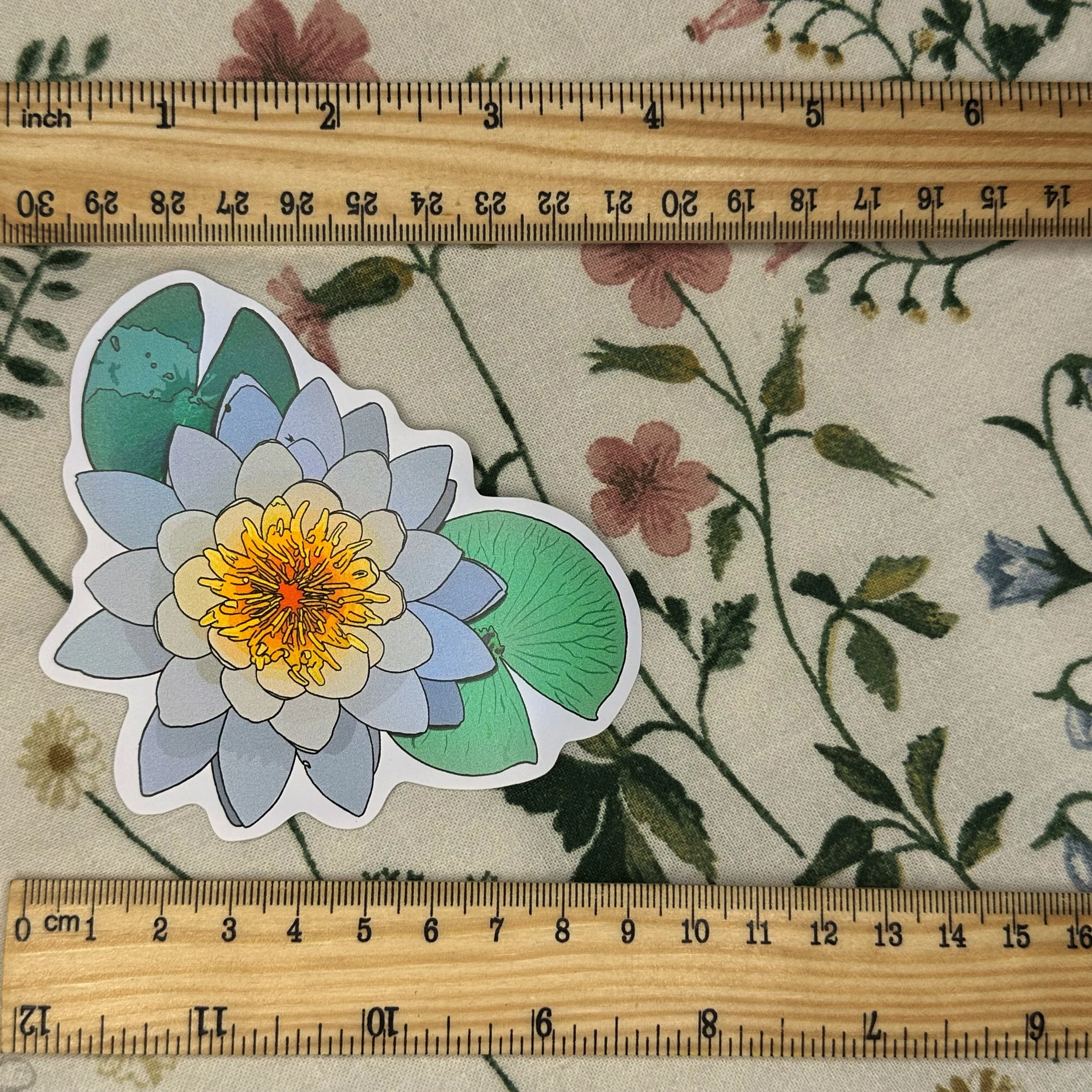 Sweet scented water lily sticker measuring about 4 inches long
