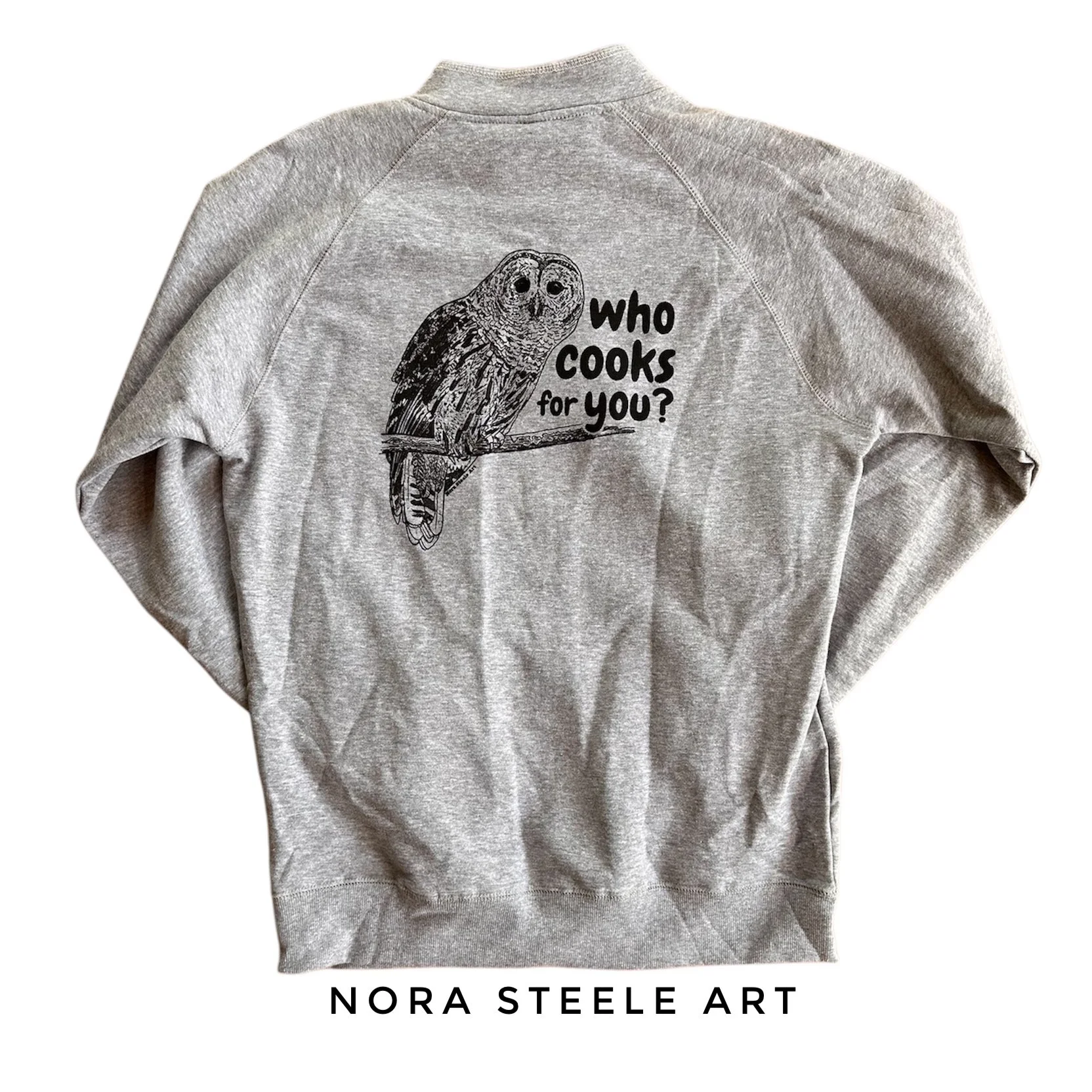 Sweatshirt screenprinted with a barred owl and text saying "who cooks for you?"