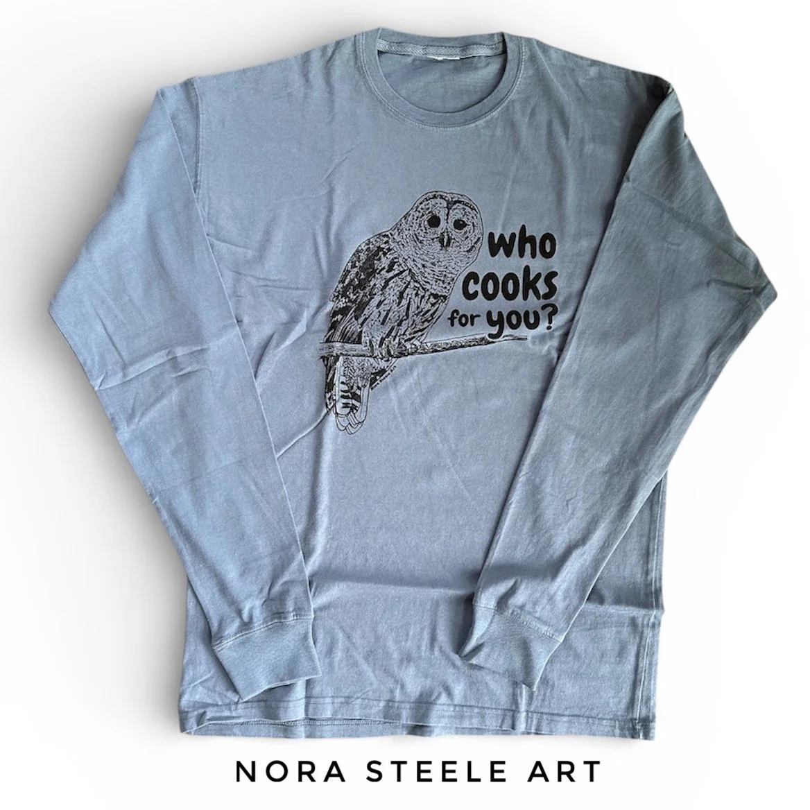 Long-sleeve shirt screenprinted with a barred owl and text saying "who cooks for you?"