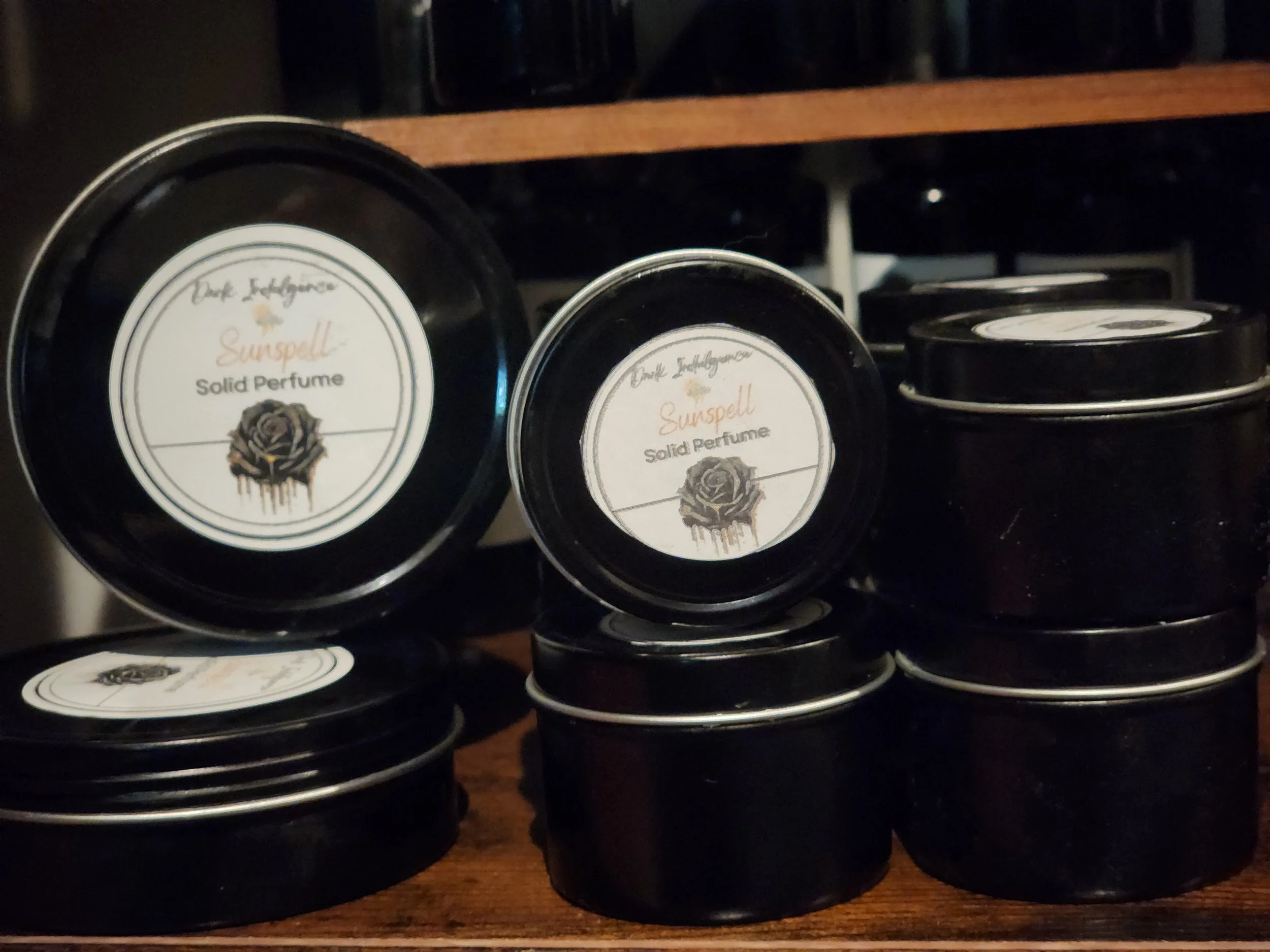 solid perfume - lg & mini tins.jpg