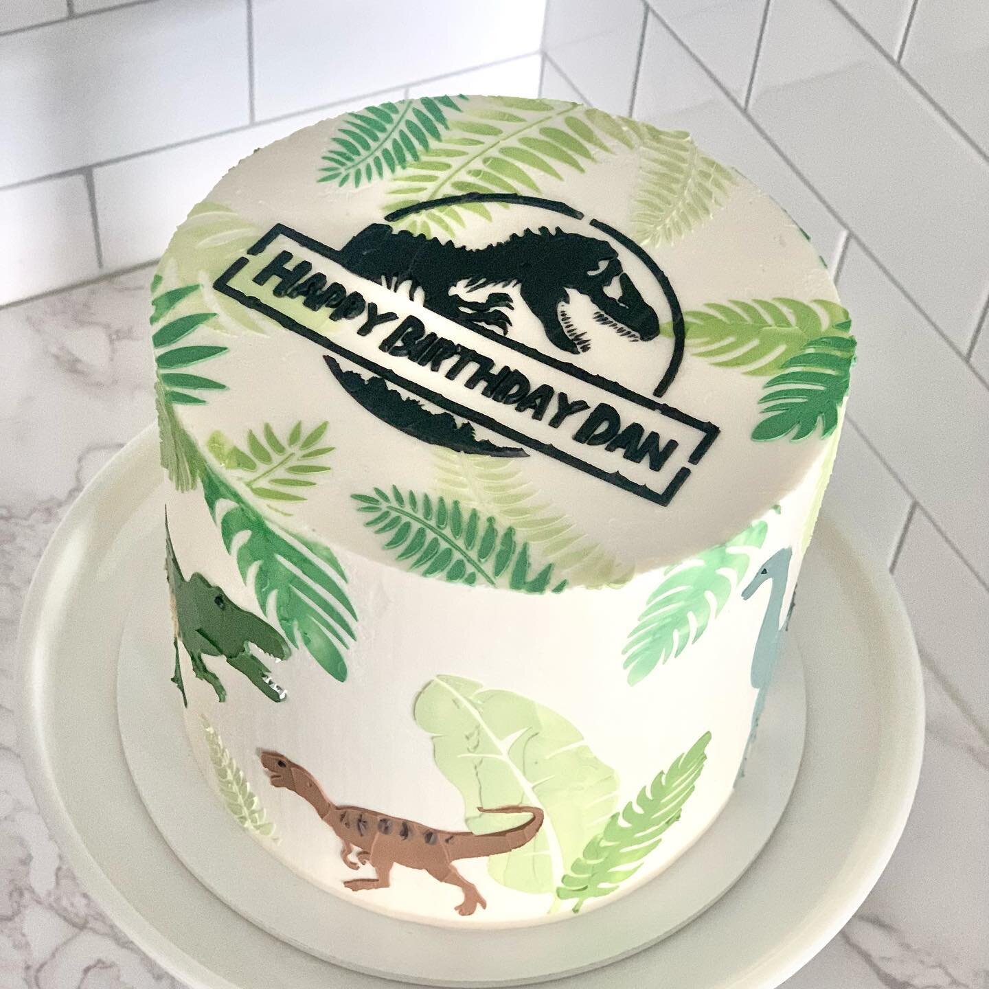 Another dino themed cake for a Jurassic Park fan! Inside is chocolate cake with cookies &amp; cream buttercream.