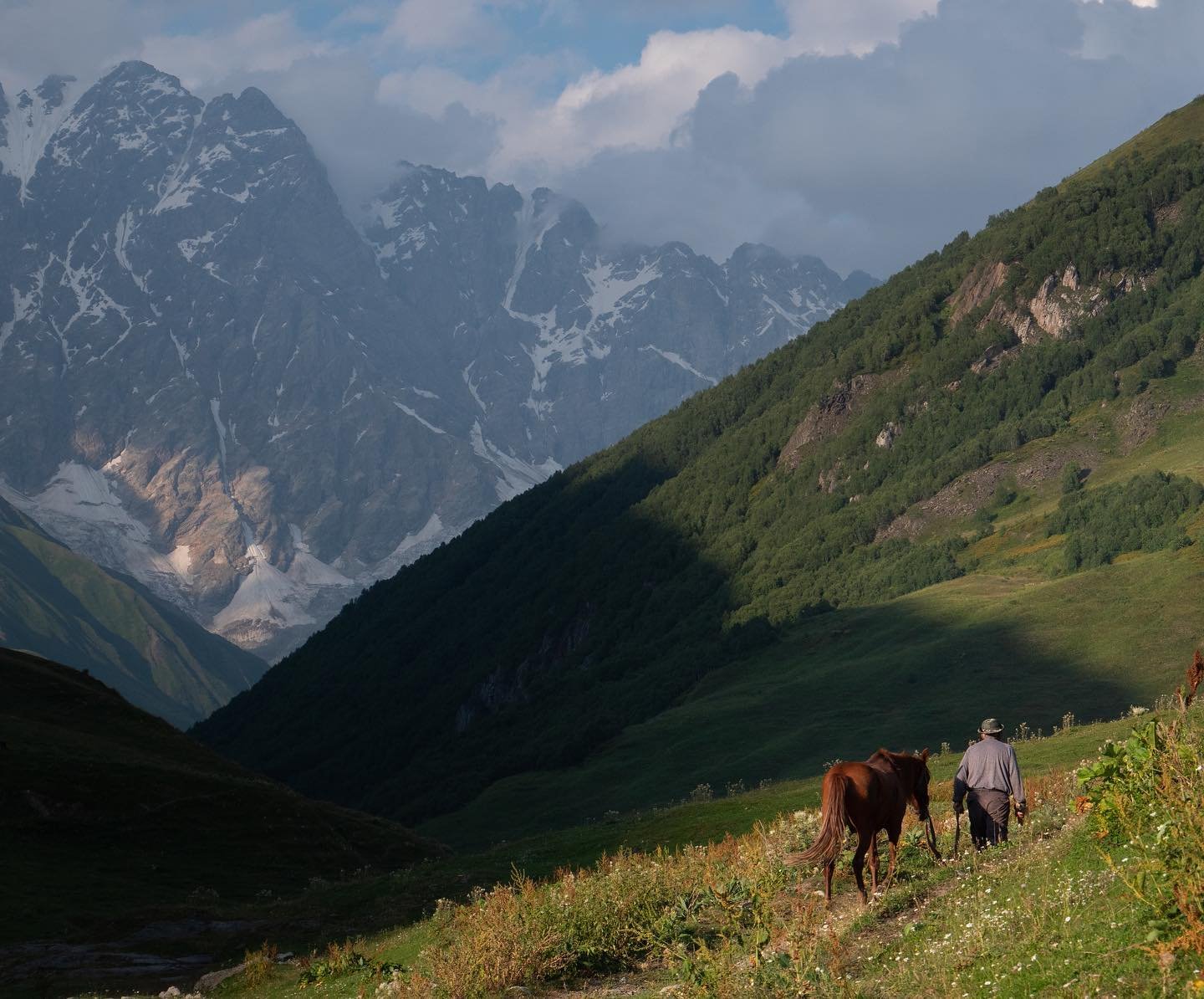 When the sun goes down, the shepherd leaves the village to look for the herd in the mountains. At night, cows and sheep are easy preys for bears and wolves. Svaneti region is famous for having large numbers of those predators.

Ushguli, Georgia
.
.
.