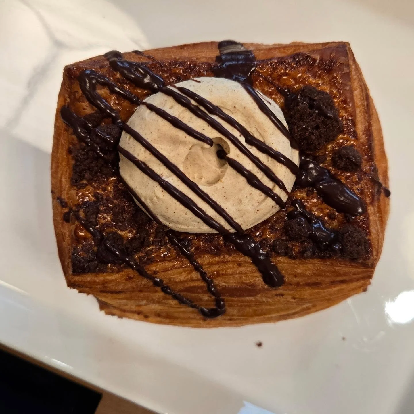 We're in pumpkin spice mode here at the bakery.

Pumpkin cream with chocolate chips, chocolate streussel, and chocolate drizzle.