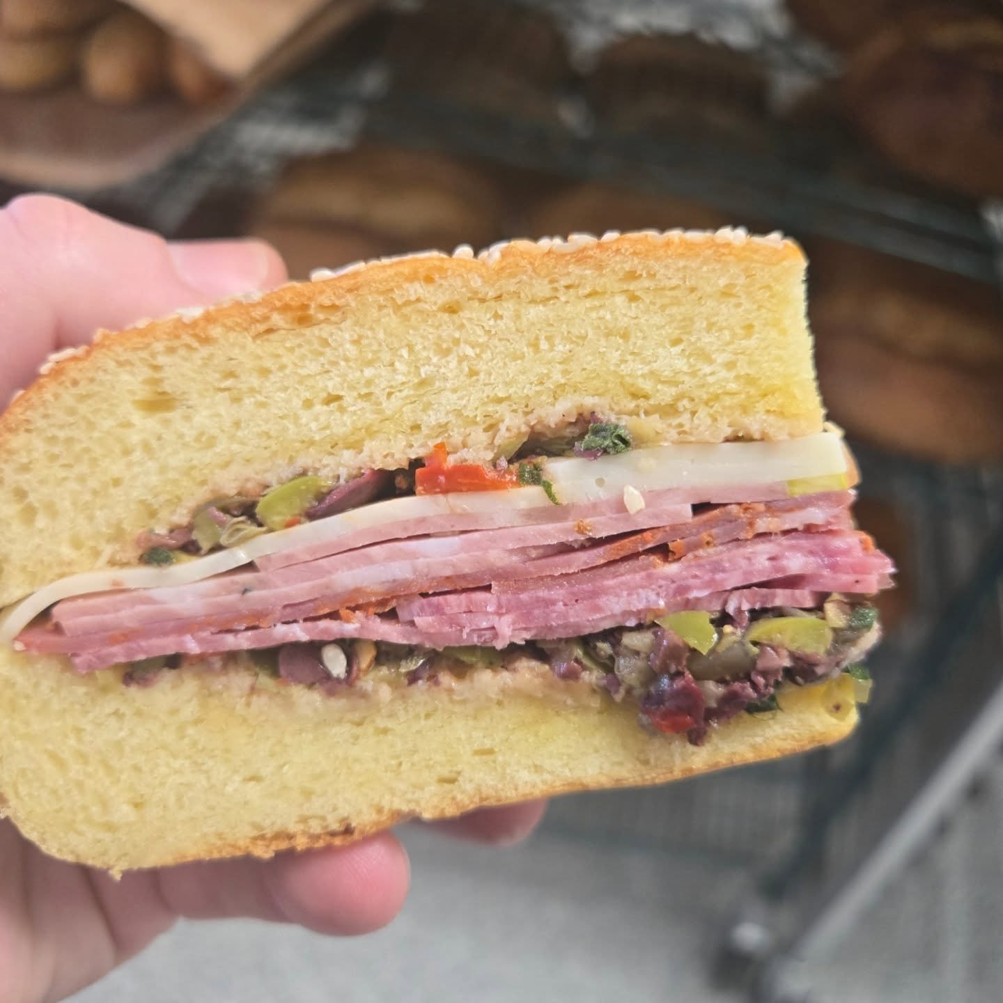 Muffalettas by the 1/4, 1/2 and Whole all weekend or until we're sold out (1/4 pictured above).

Sesame soft roll with mortadella, capacola, salami, provolone and olive salad.  A New Orleans classic.