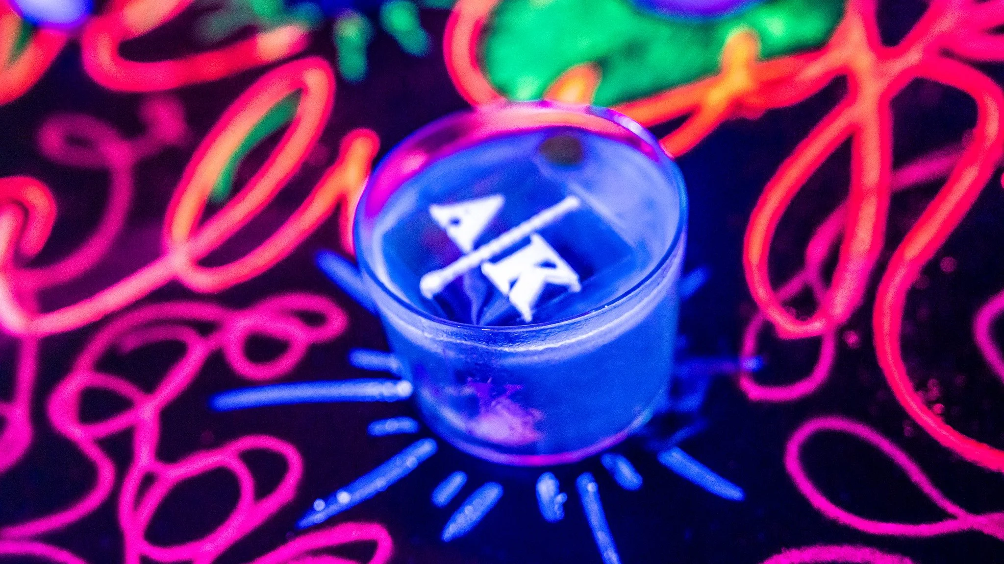 Neon-lit cocktail at Marriott's All Kinds bar, Tales of the Cocktail 2024