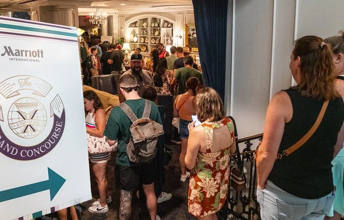 Guests lining up at the entrance to Marriott's Grand Concourse at The Ritz-Carlton, New Orleans, Tales of the Cocktail 2026
