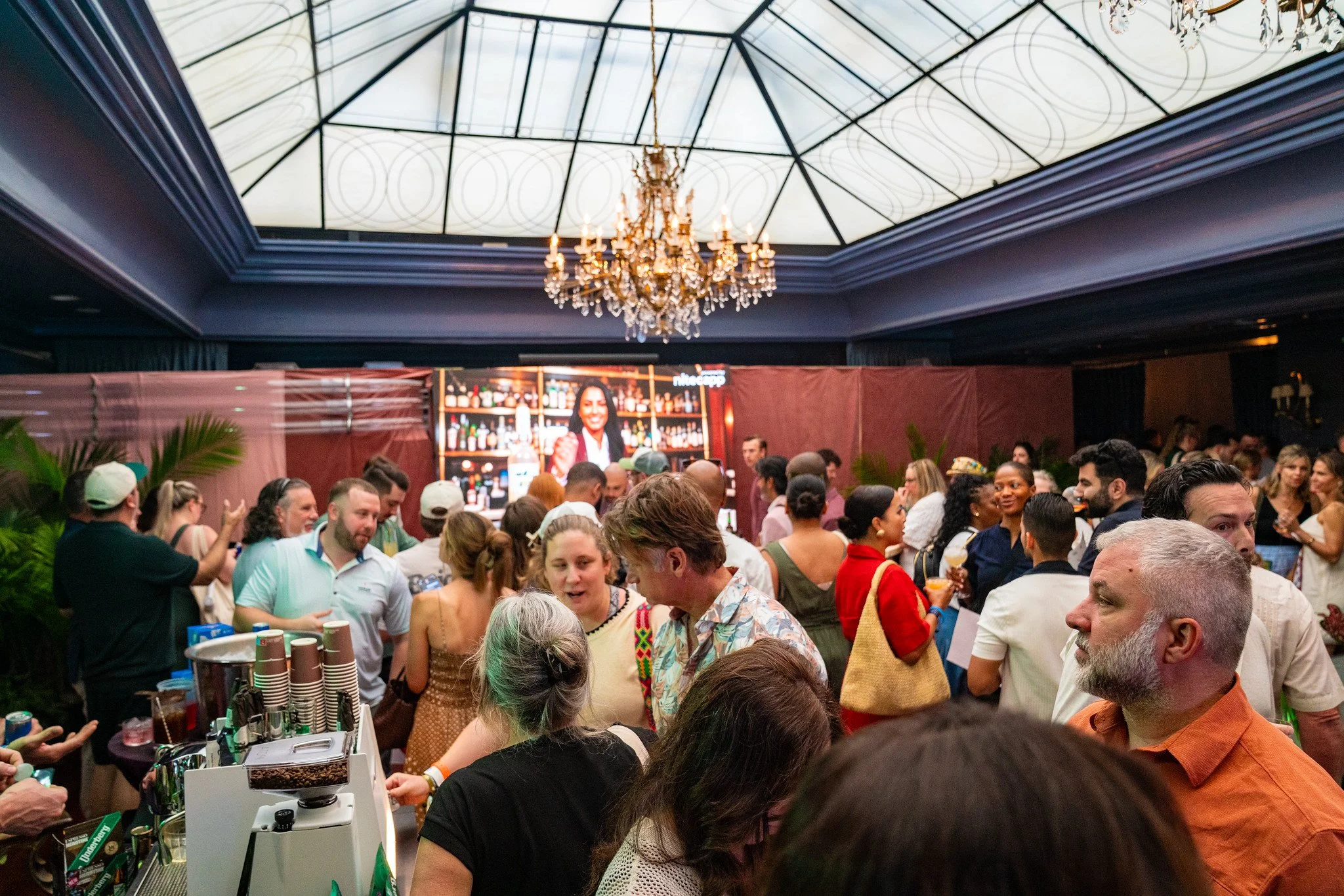 A packed Grand Concourse at The Ritz-Carlton, New Orleans, Marriott's pop-up at Tales of the Cocktail 2026